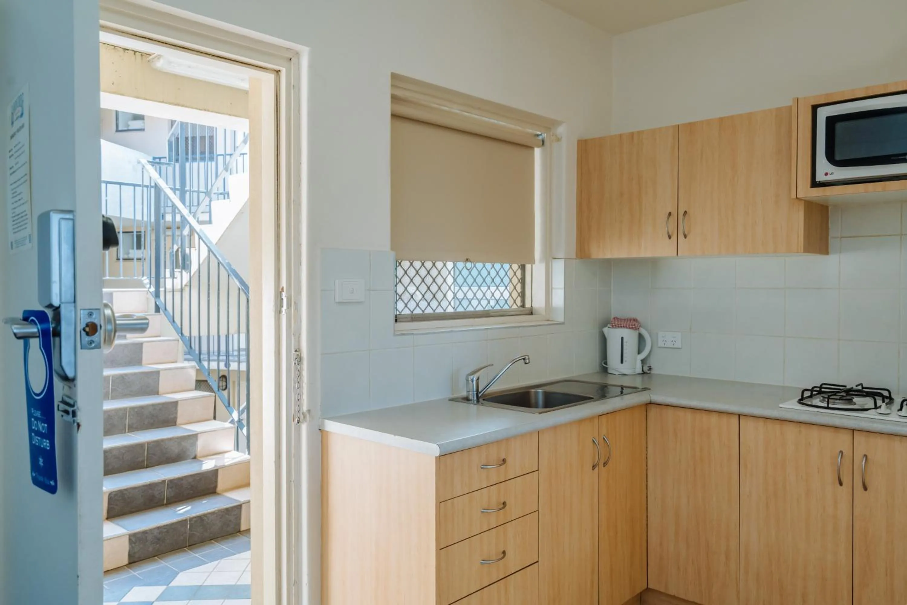 Kitchen or kitchenette in Canning Bridge Auto Lodge