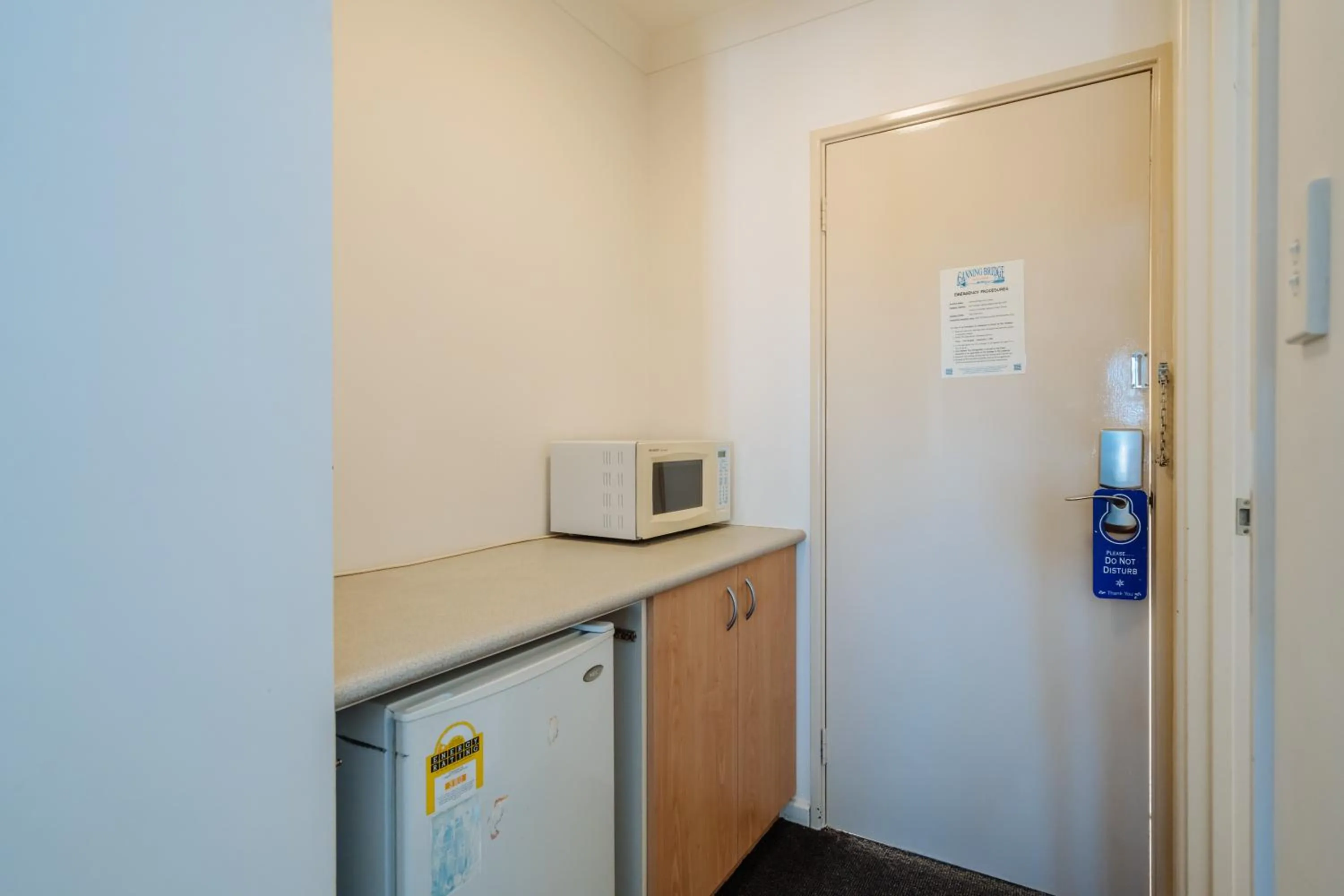 Kitchen or kitchenette in Canning Bridge Auto Lodge