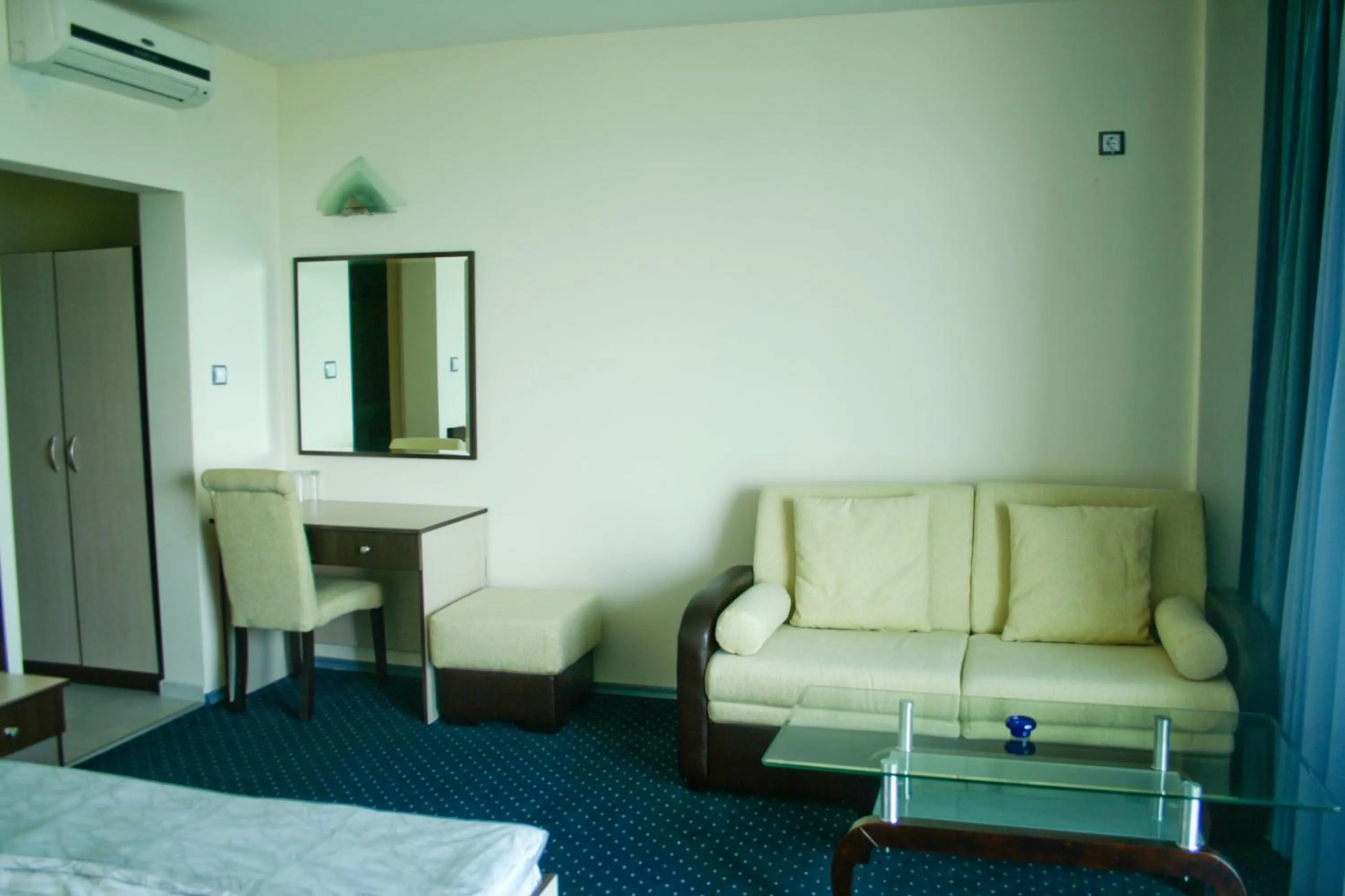 Living room, Bed in Peter Hotel