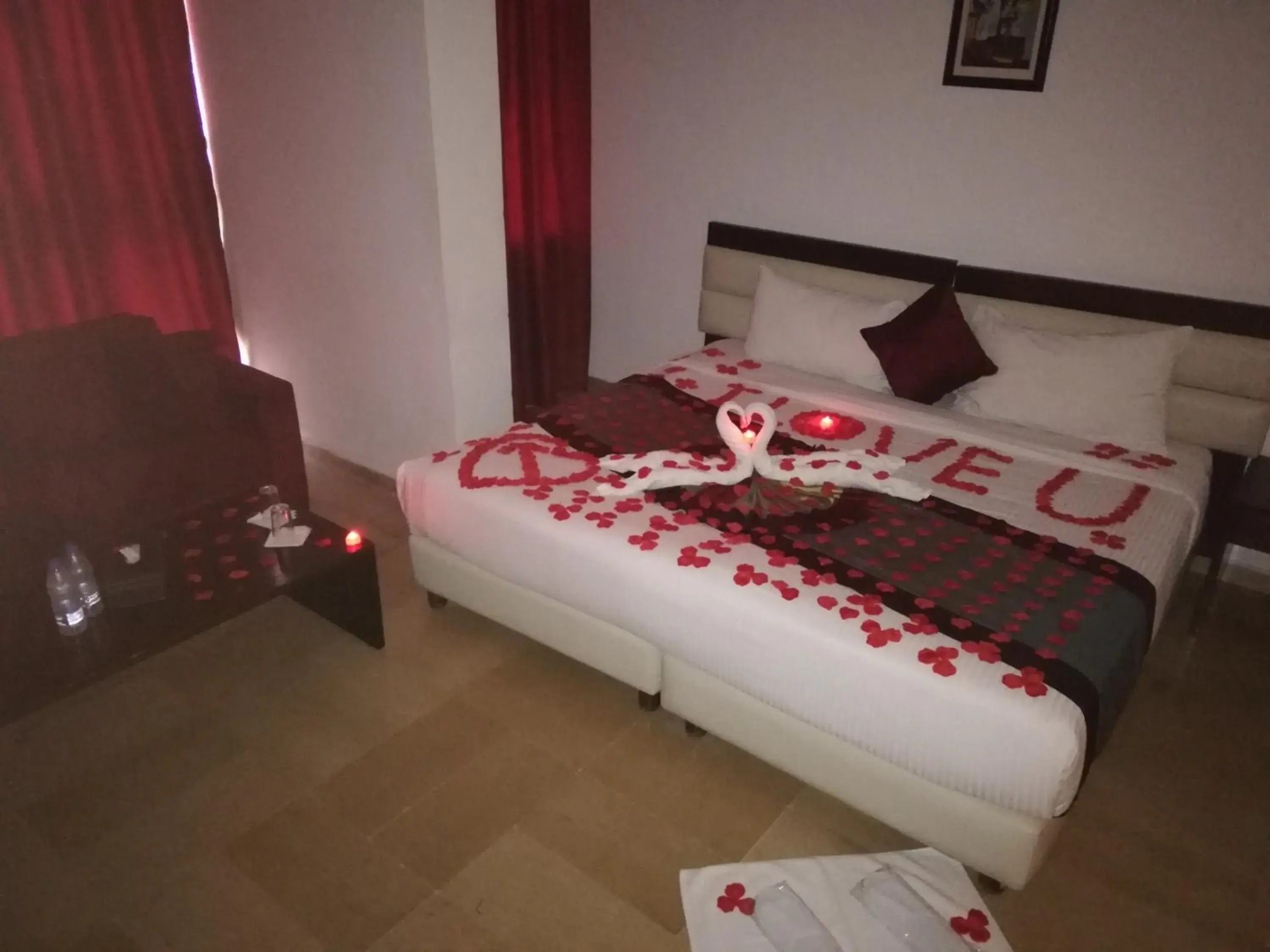 Decorative detail, Bed in Bliss 3000 Furnished Studios Decorative detail, Bed in Bliss 3000 Furnished Studios