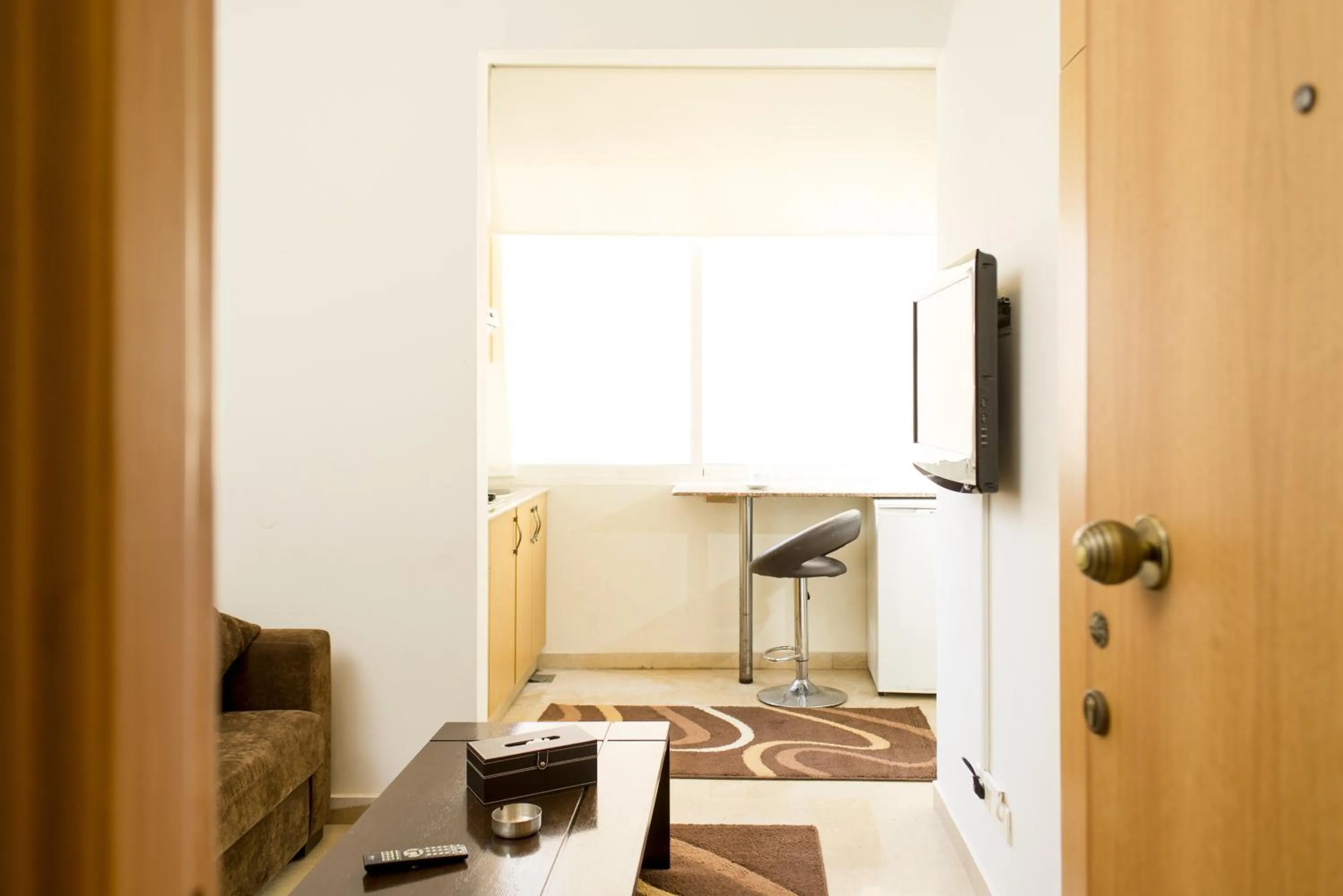 Seating area in Bliss 3000 Furnished Studios