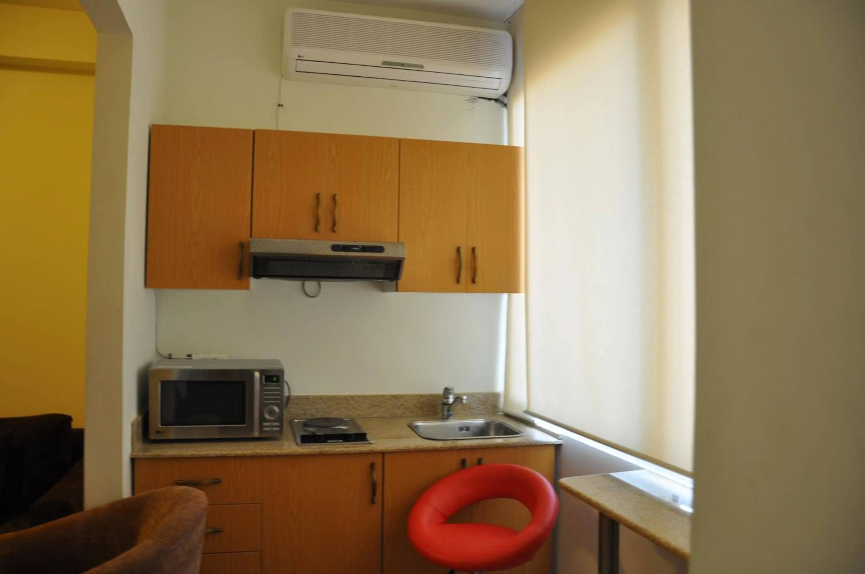 Kitchen or kitchenette in Bliss 3000 Furnished Studios