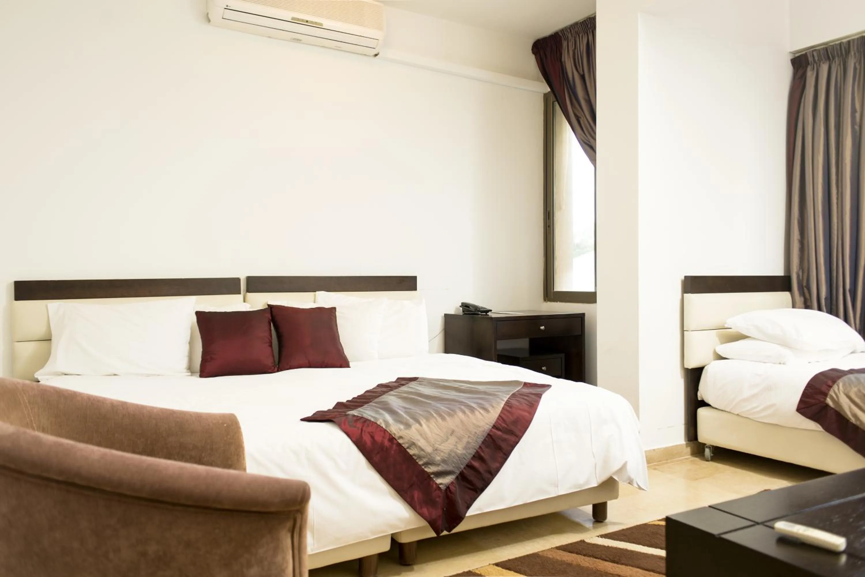 Bed in Bliss 3000 Furnished Studios