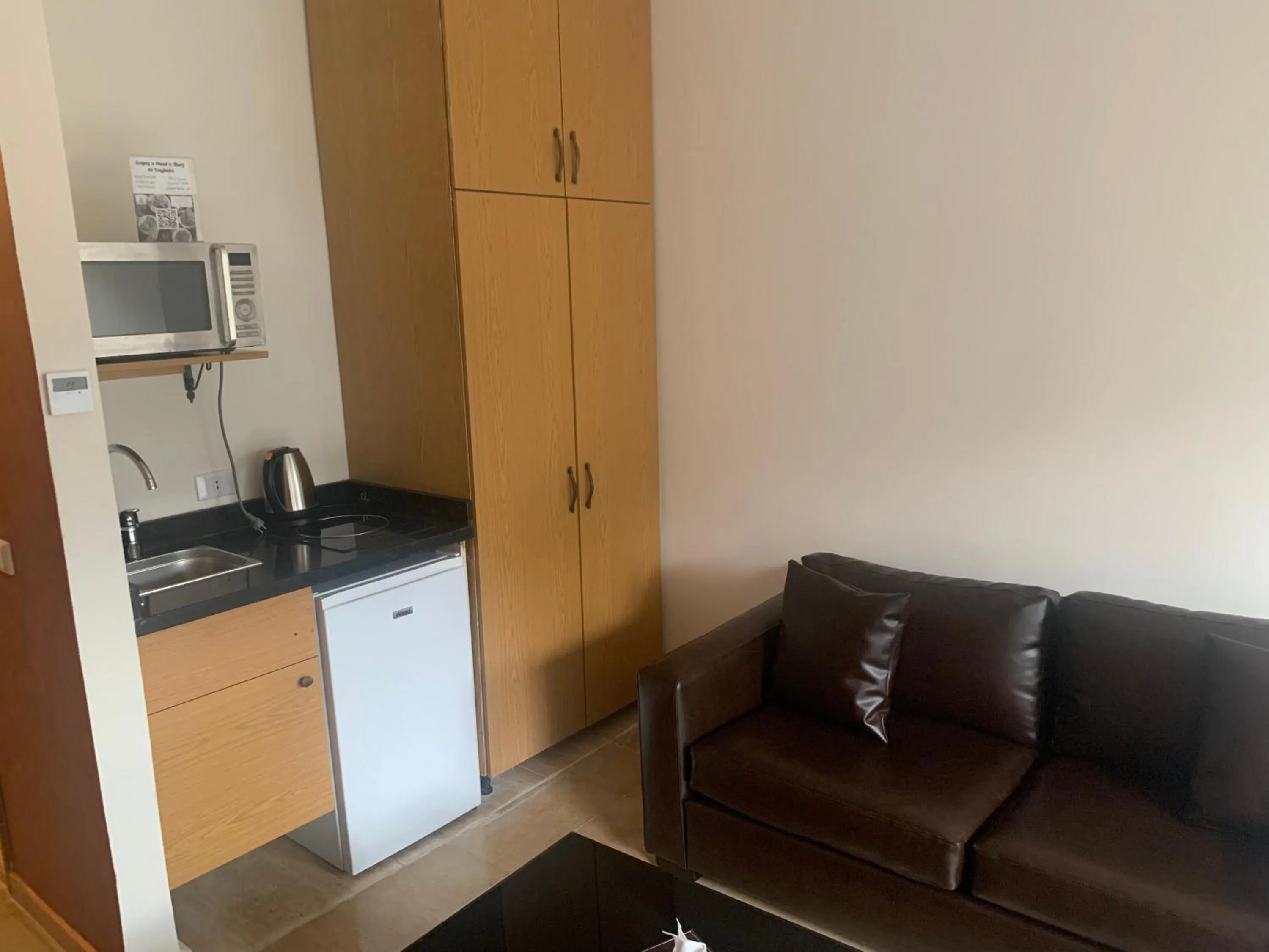 Kitchen or kitchenette in Bliss 3000 Furnished Studios