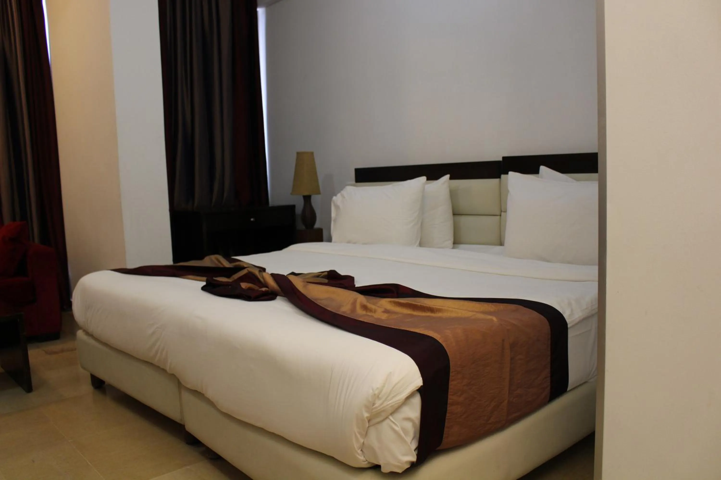 Bed in Bliss 3000 Furnished Studios