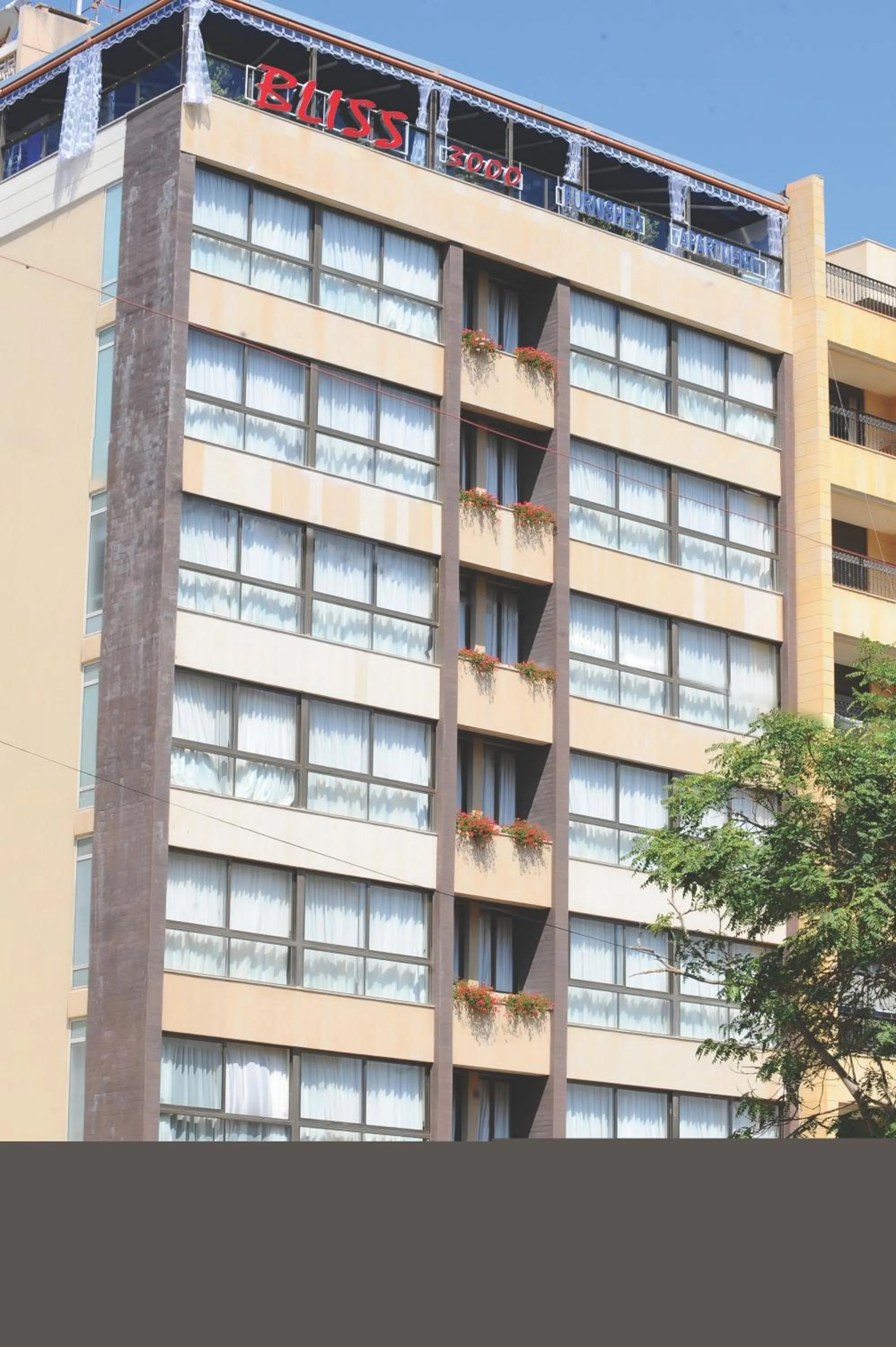 Property building in Bliss 3000 Furnished Studios