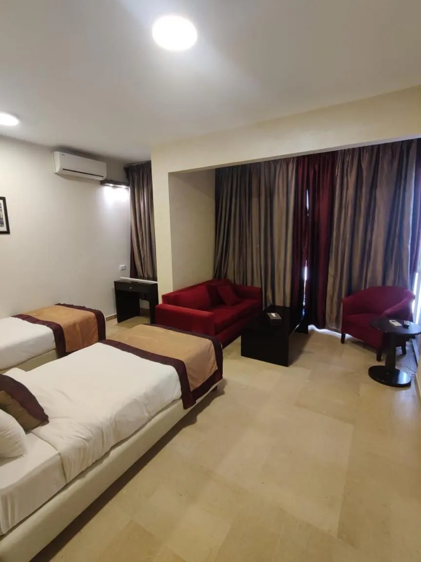 Photo of the whole room, Bed in Bliss 3000 Furnished Studios