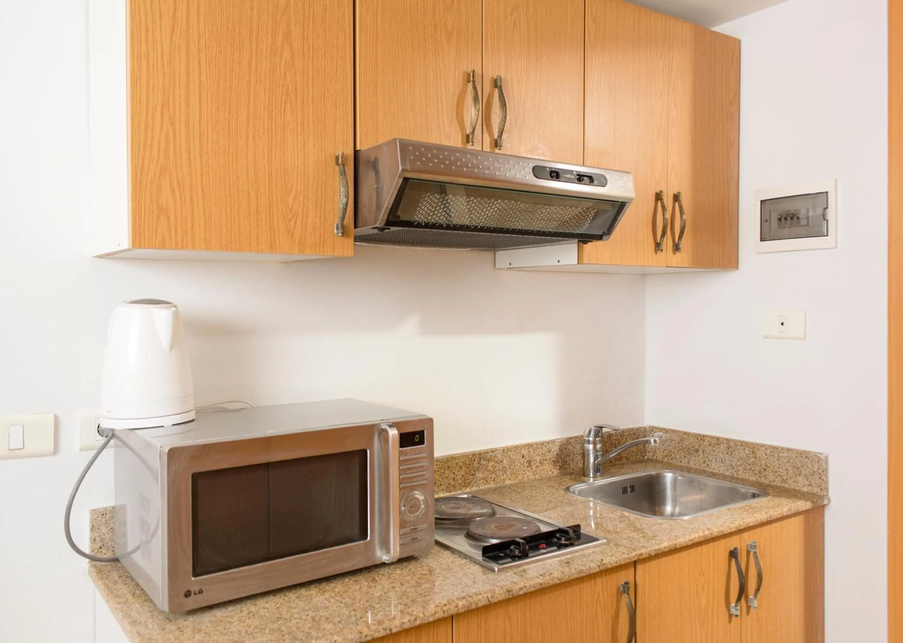 Kitchen or kitchenette in Bliss 3000 Furnished Studios