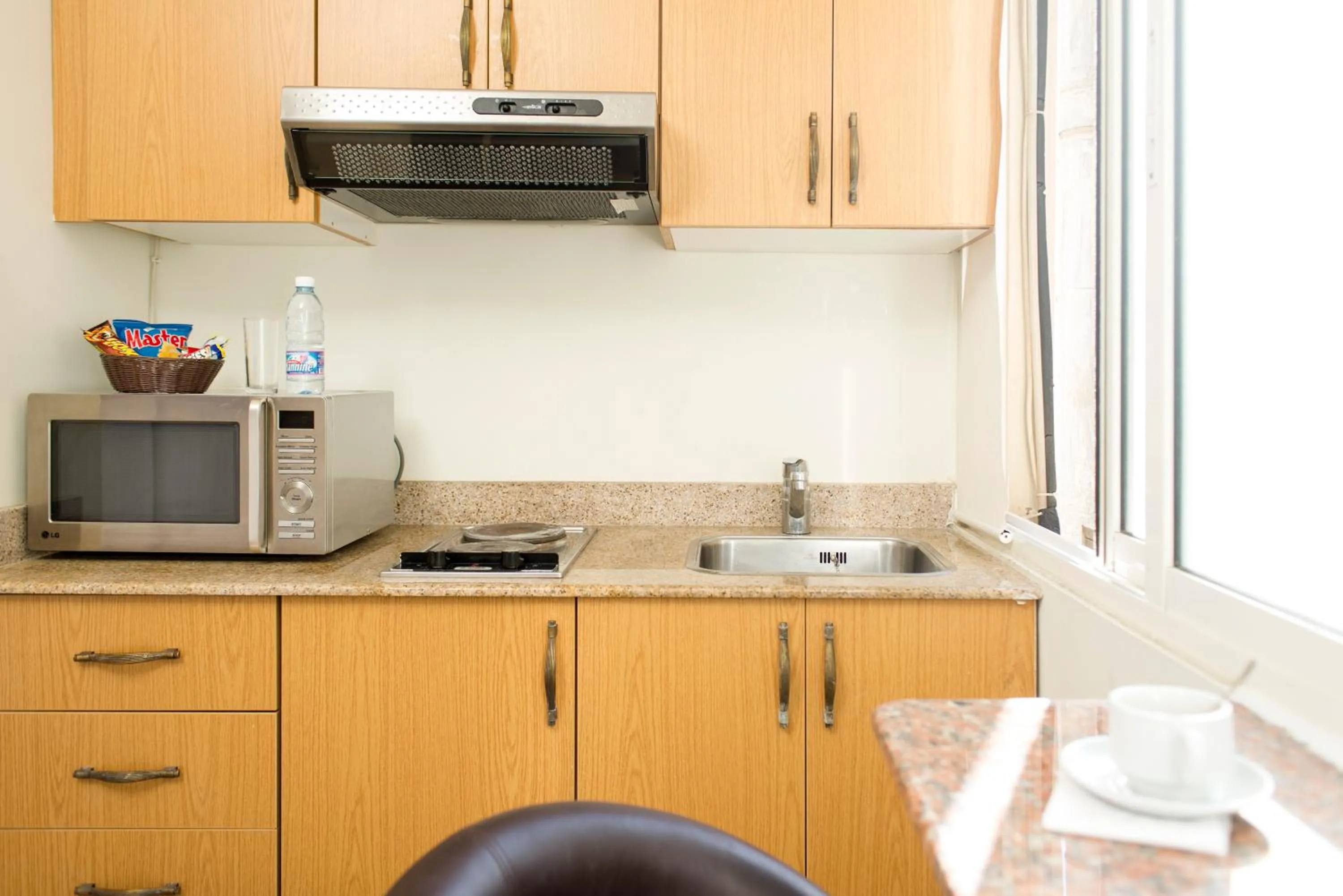 Kitchen or kitchenette in Bliss 3000 Furnished Studios