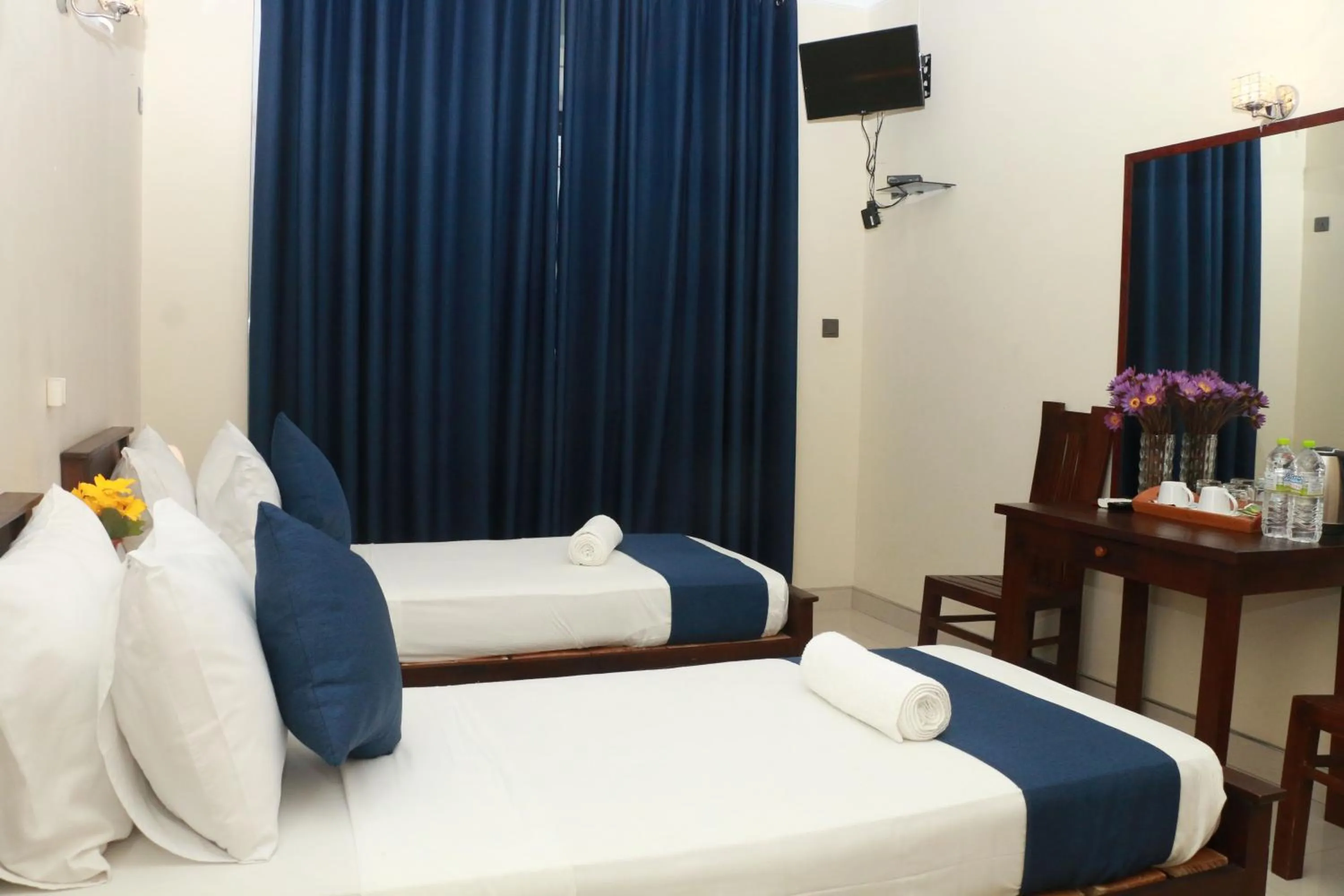 Bed in Queens Beach Hotel