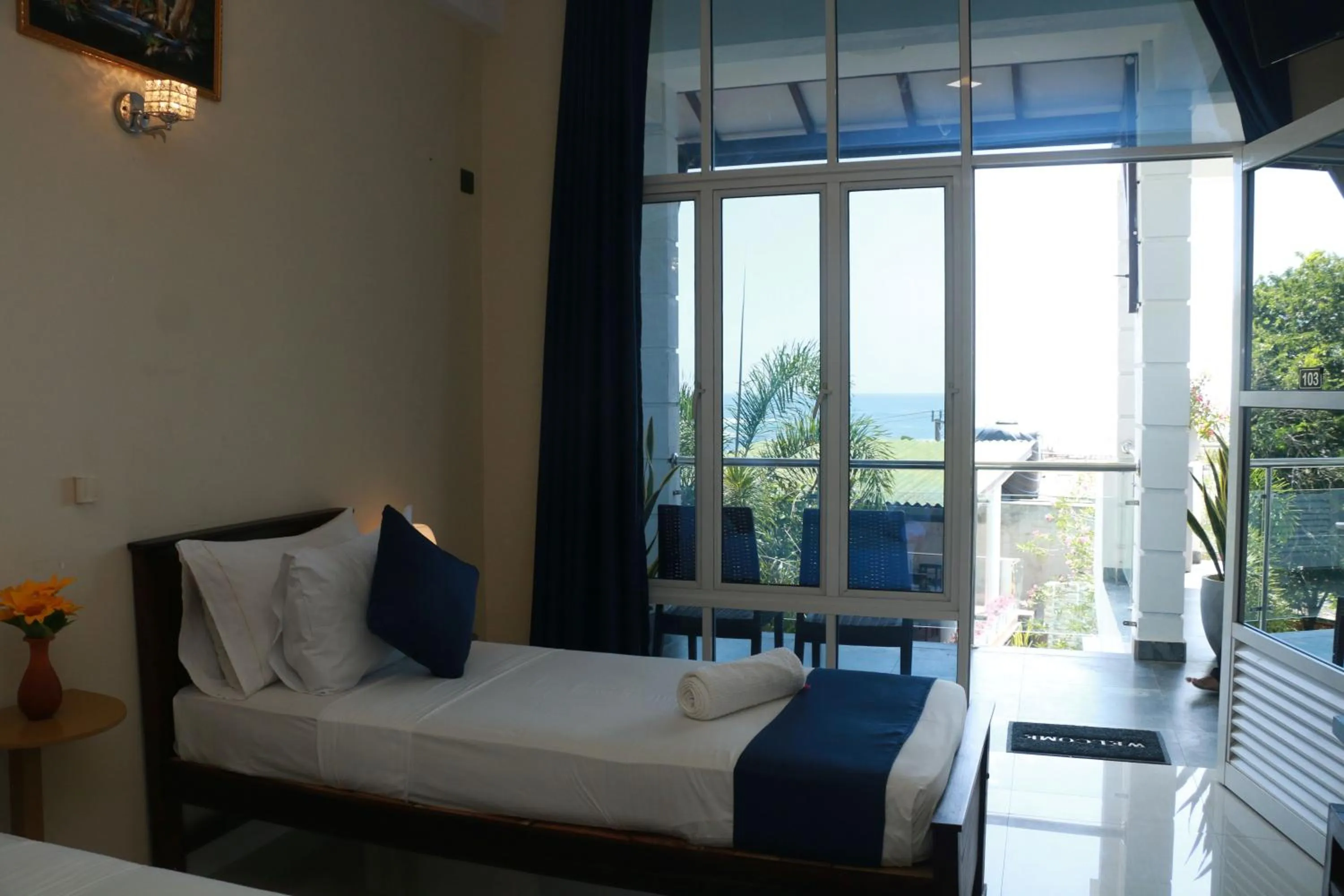 Bed in Queens Beach Hotel