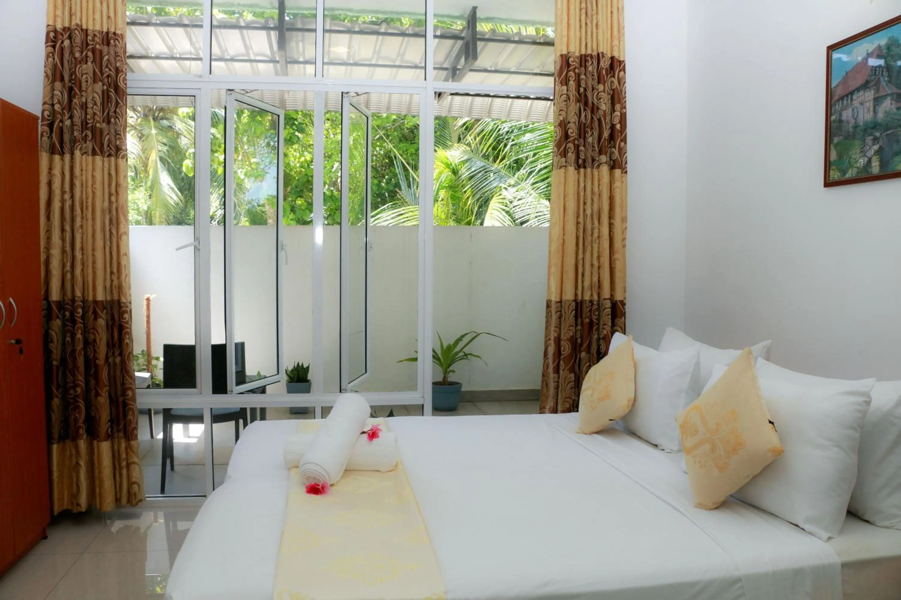 Bed in Queens Beach Hotel