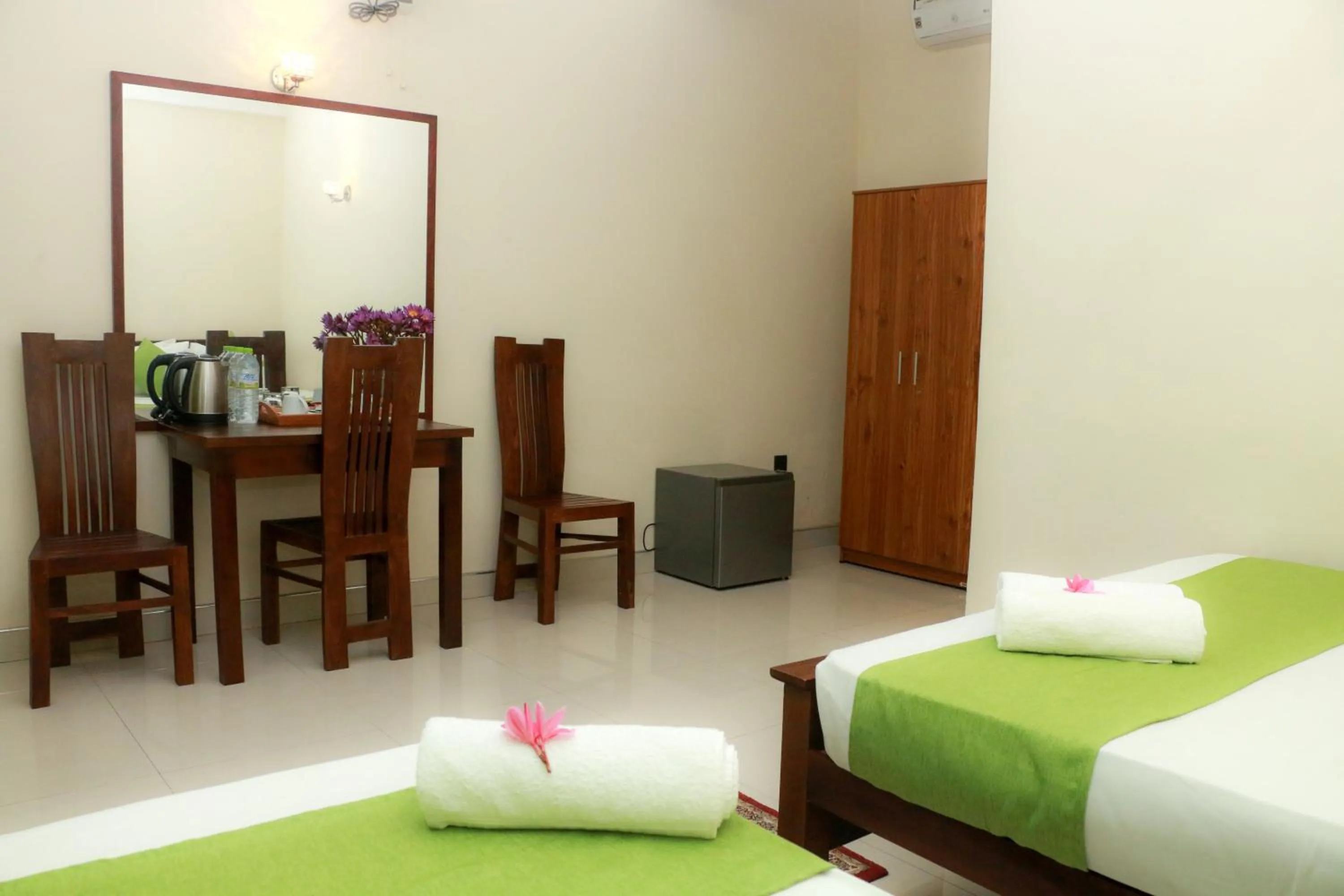 Bed in Queens Beach Hotel