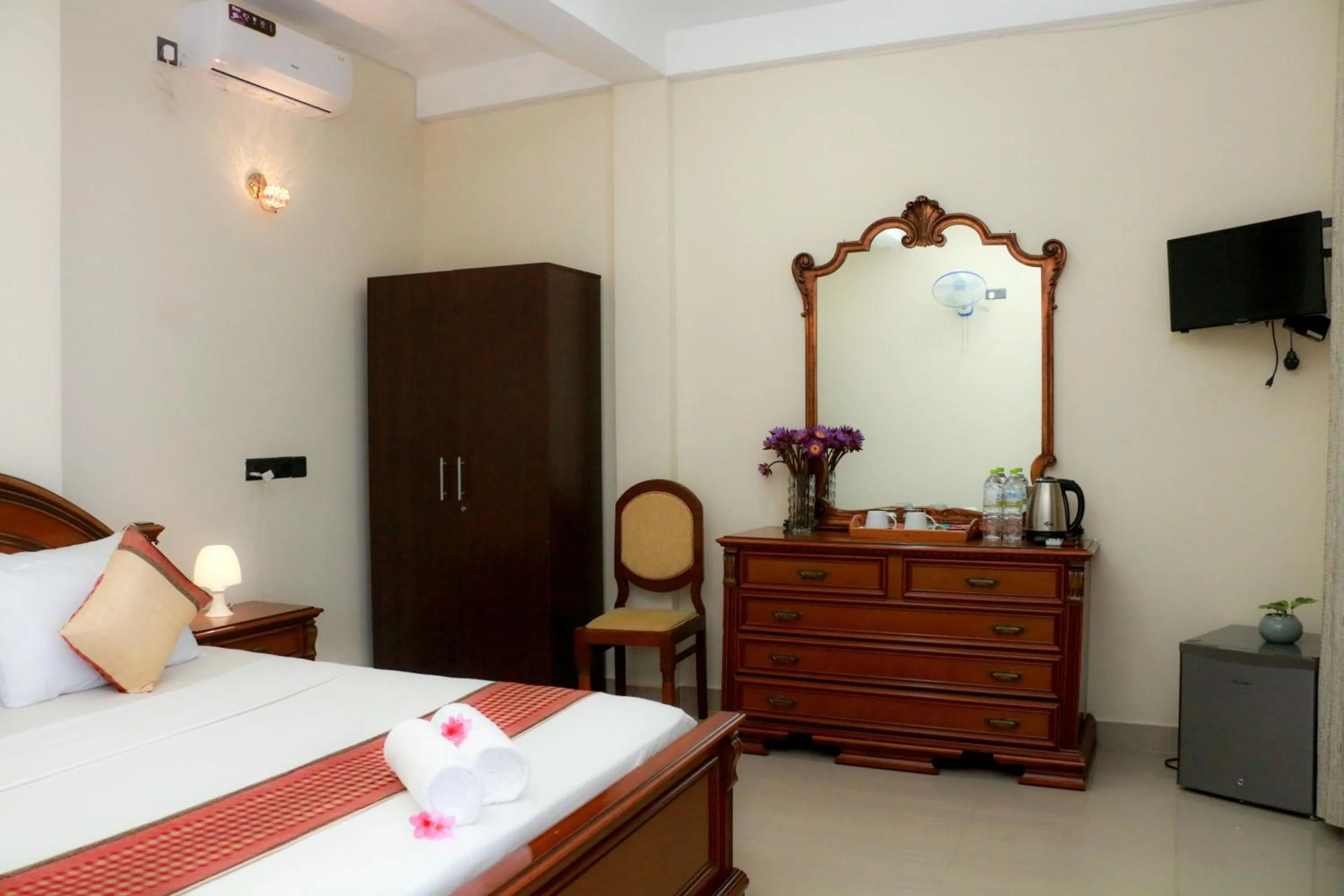 Bed in Queens Beach Hotel