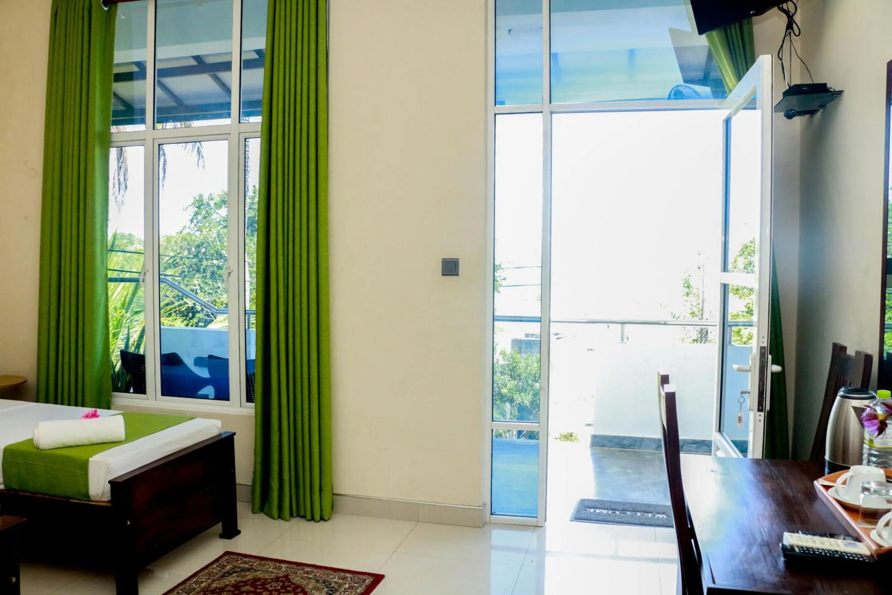 Bed in Queens Beach Hotel