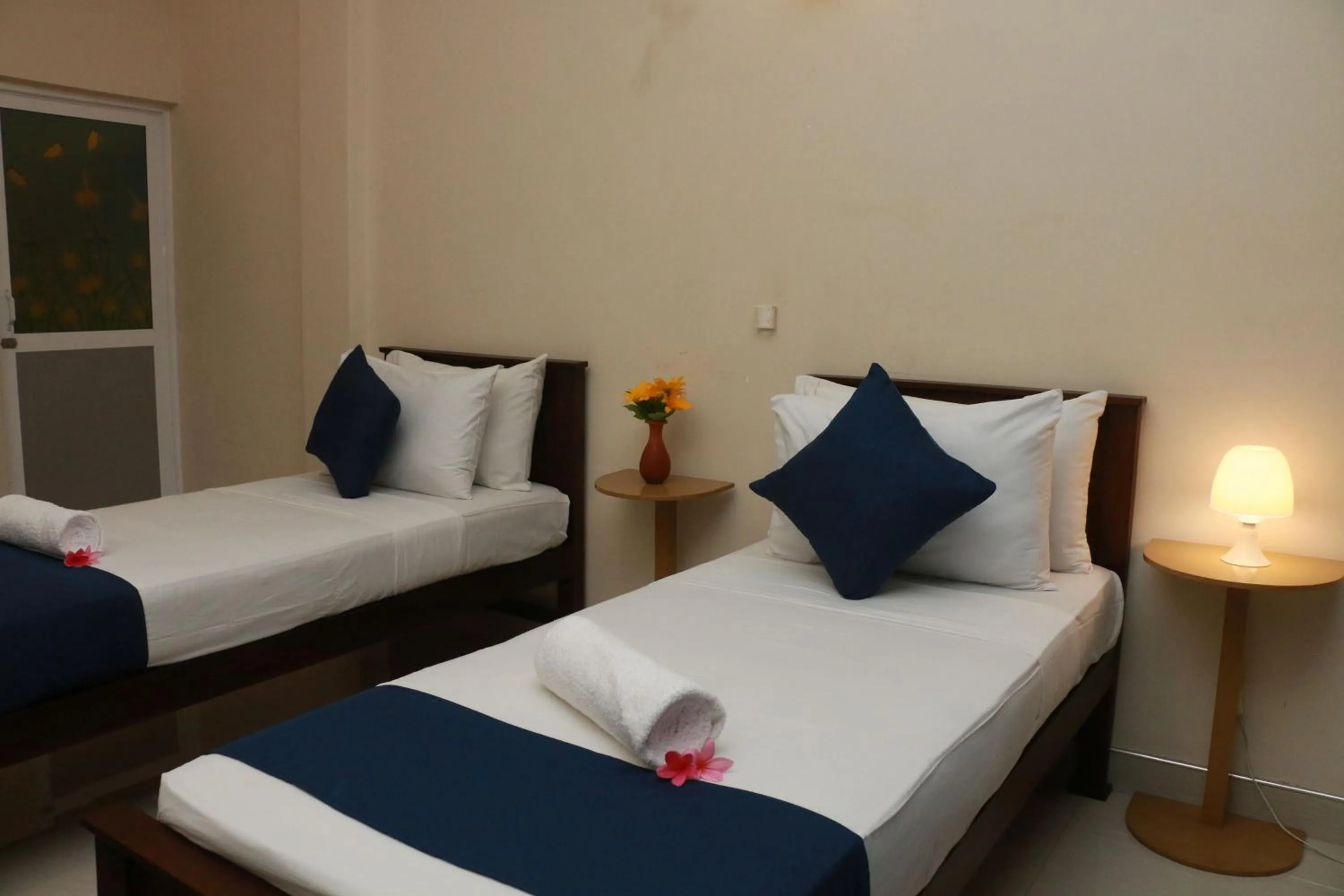 Bed in Queens Beach Hotel