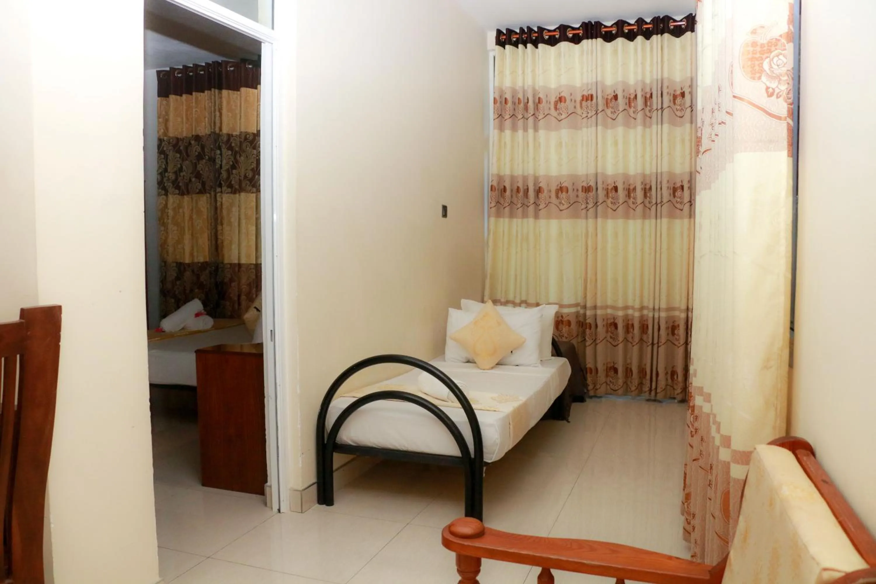 Bed in Queens Beach Hotel