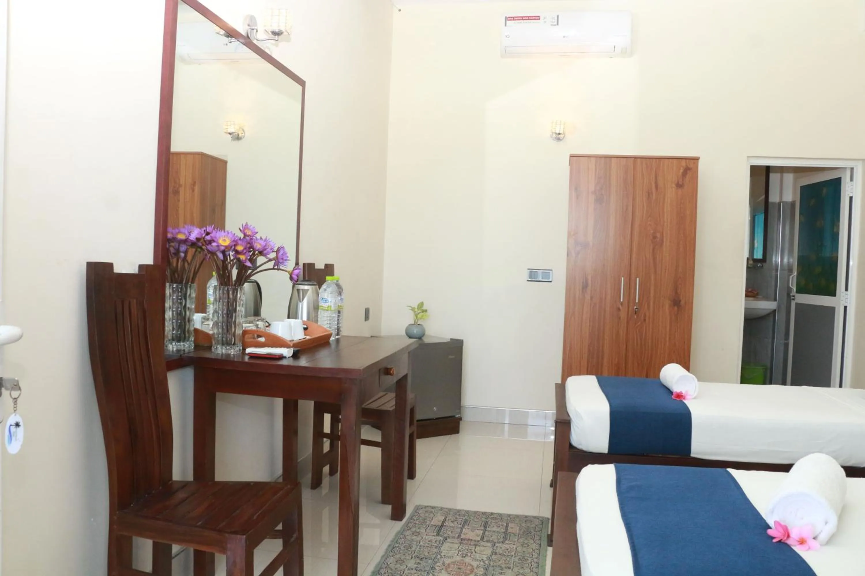 Bed in Queens Beach Hotel