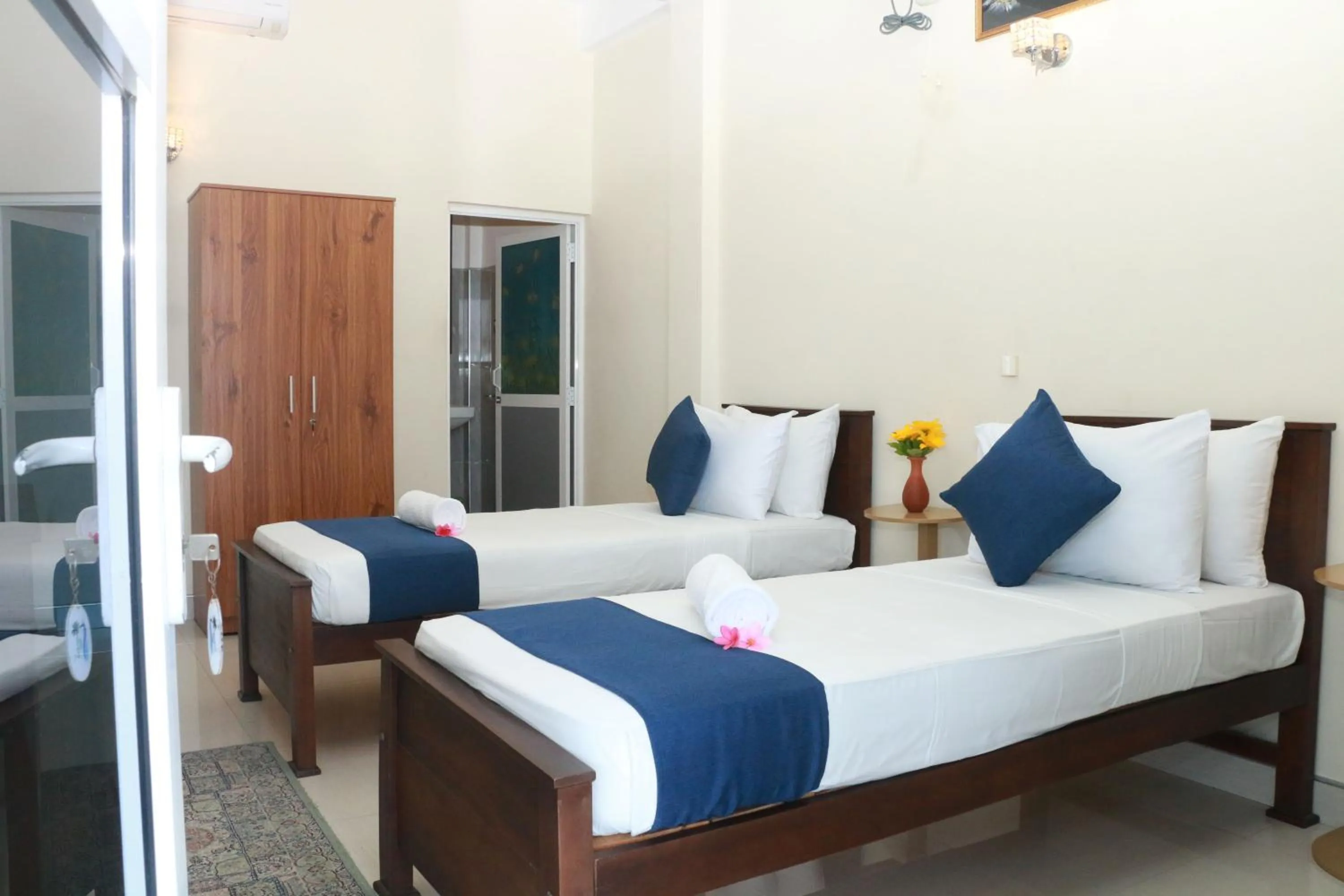 Bed in Queens Beach Hotel