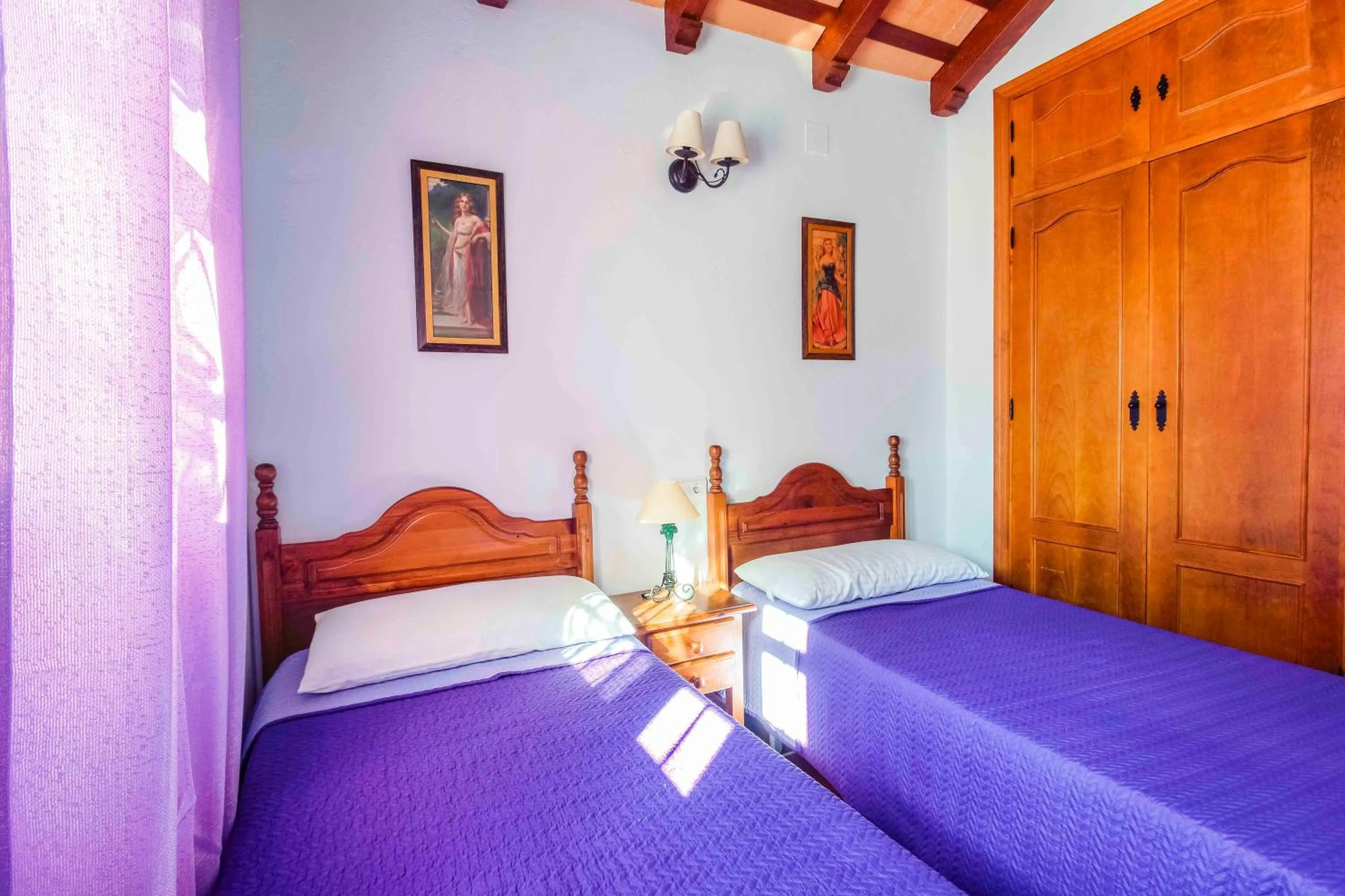 Bed in Vivienda Rural Atlántico Sur & Familias