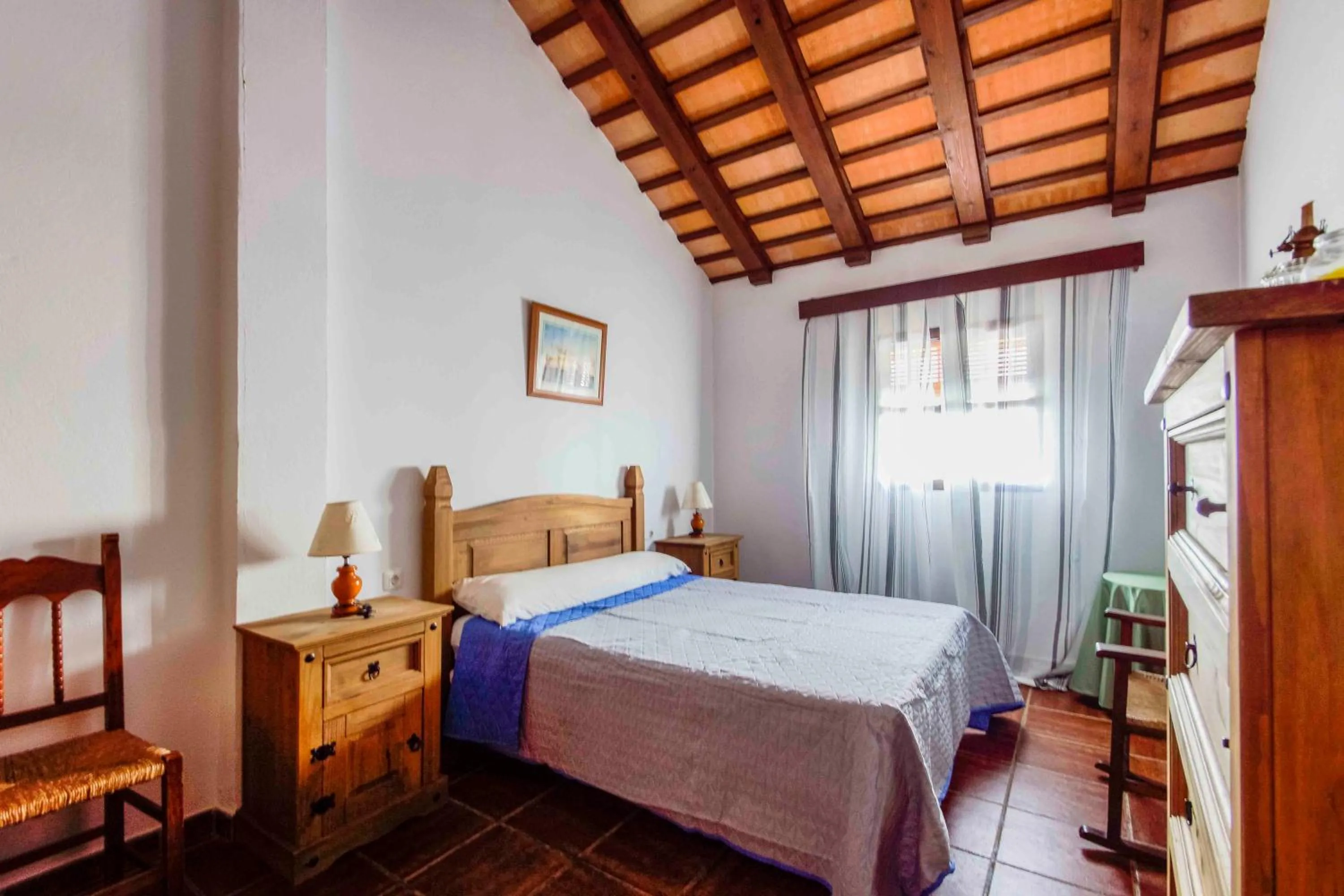 Bed in Vivienda Rural Atlántico Sur & Familias