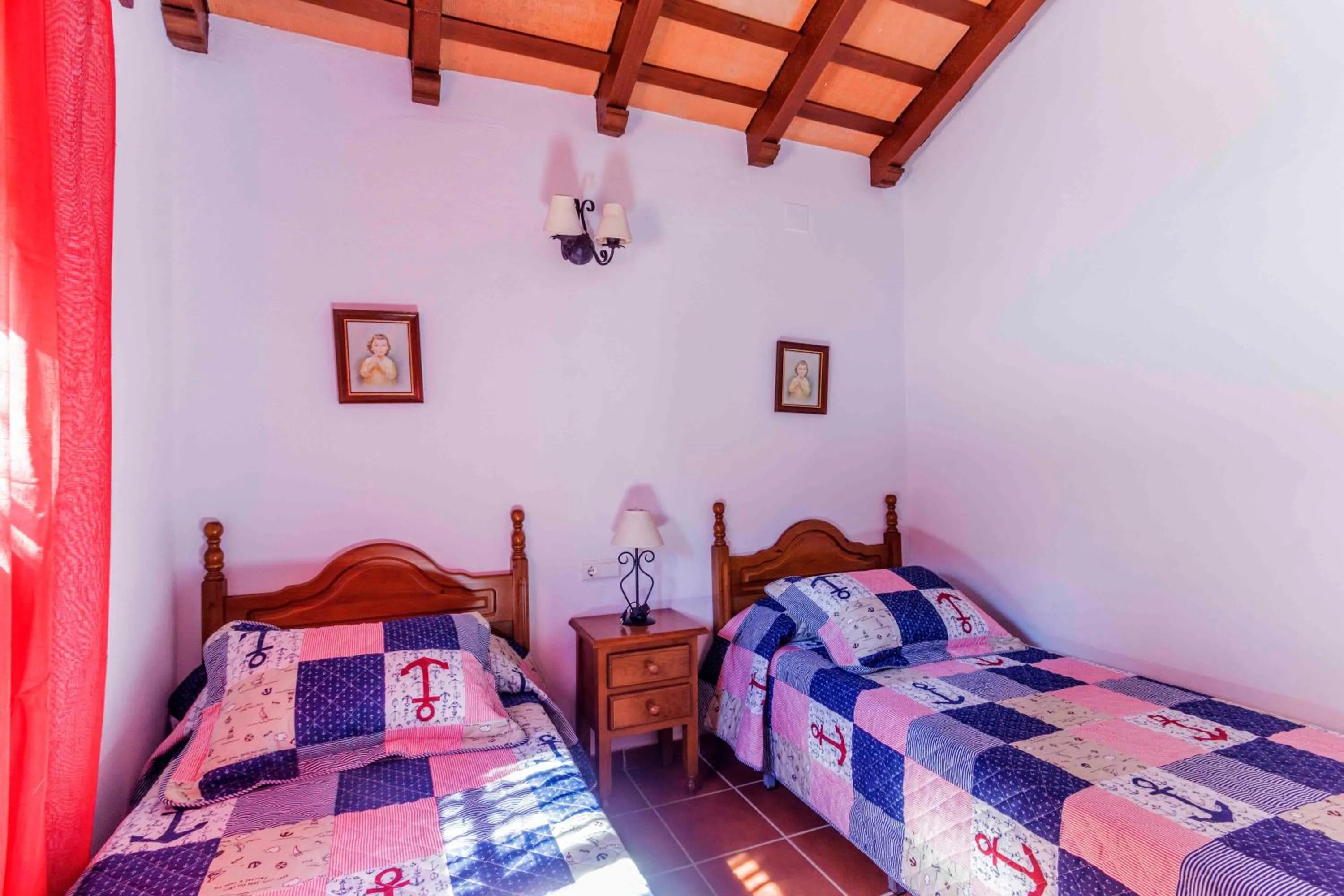 Bed in Vivienda Rural Atlántico Sur & Familias