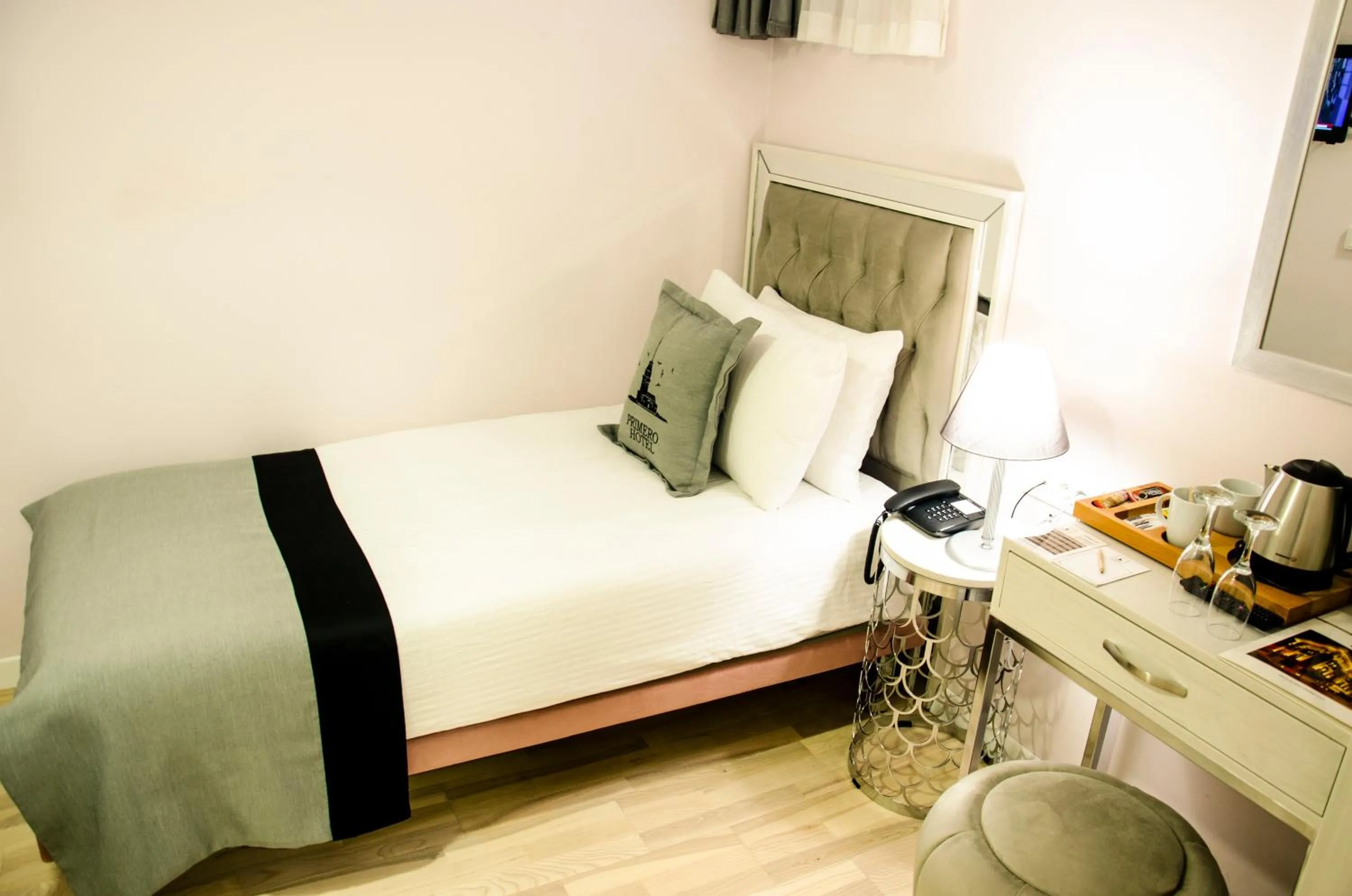 Bed in Primero Hotel