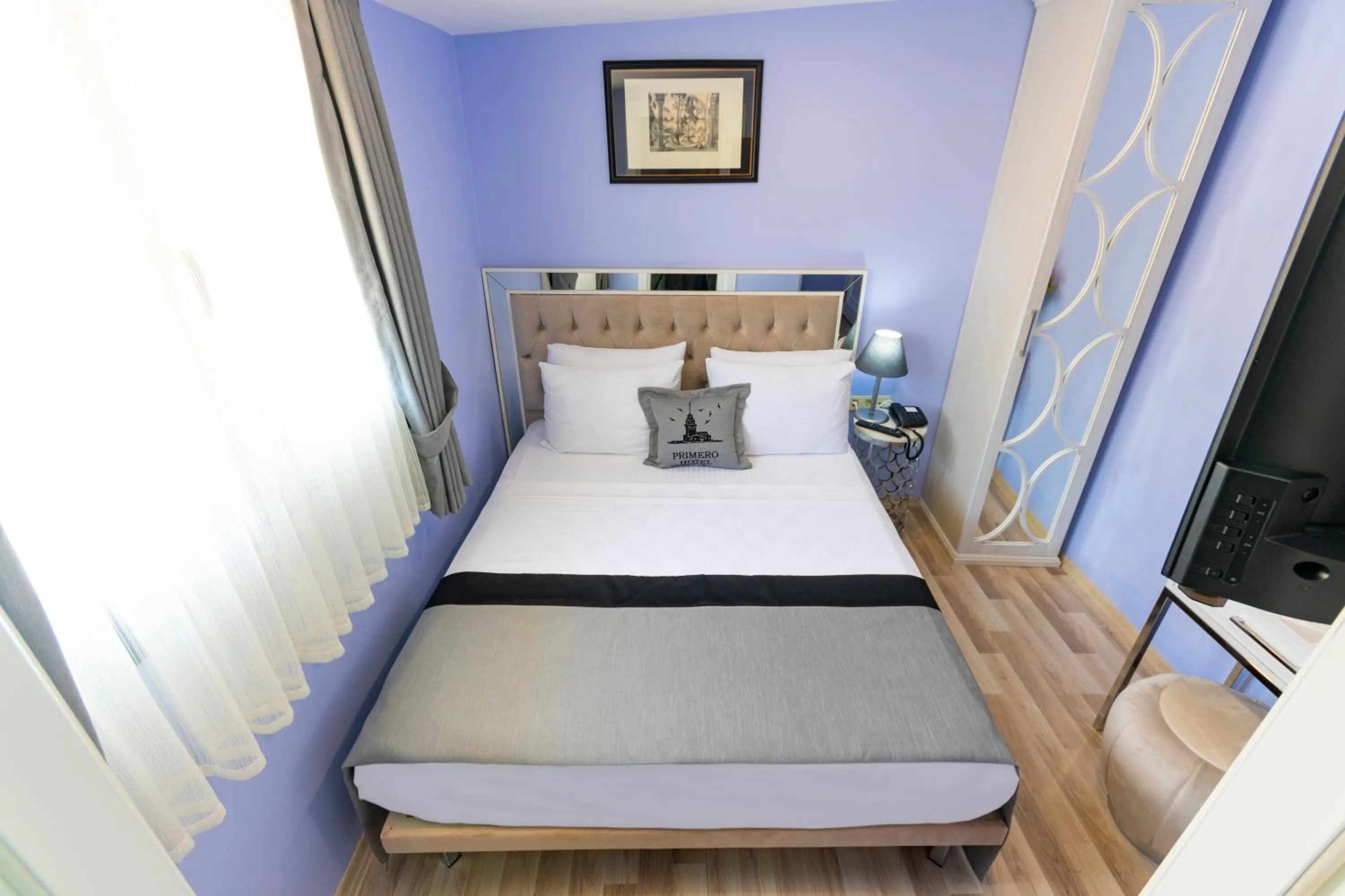 Bed in Primero Hotel