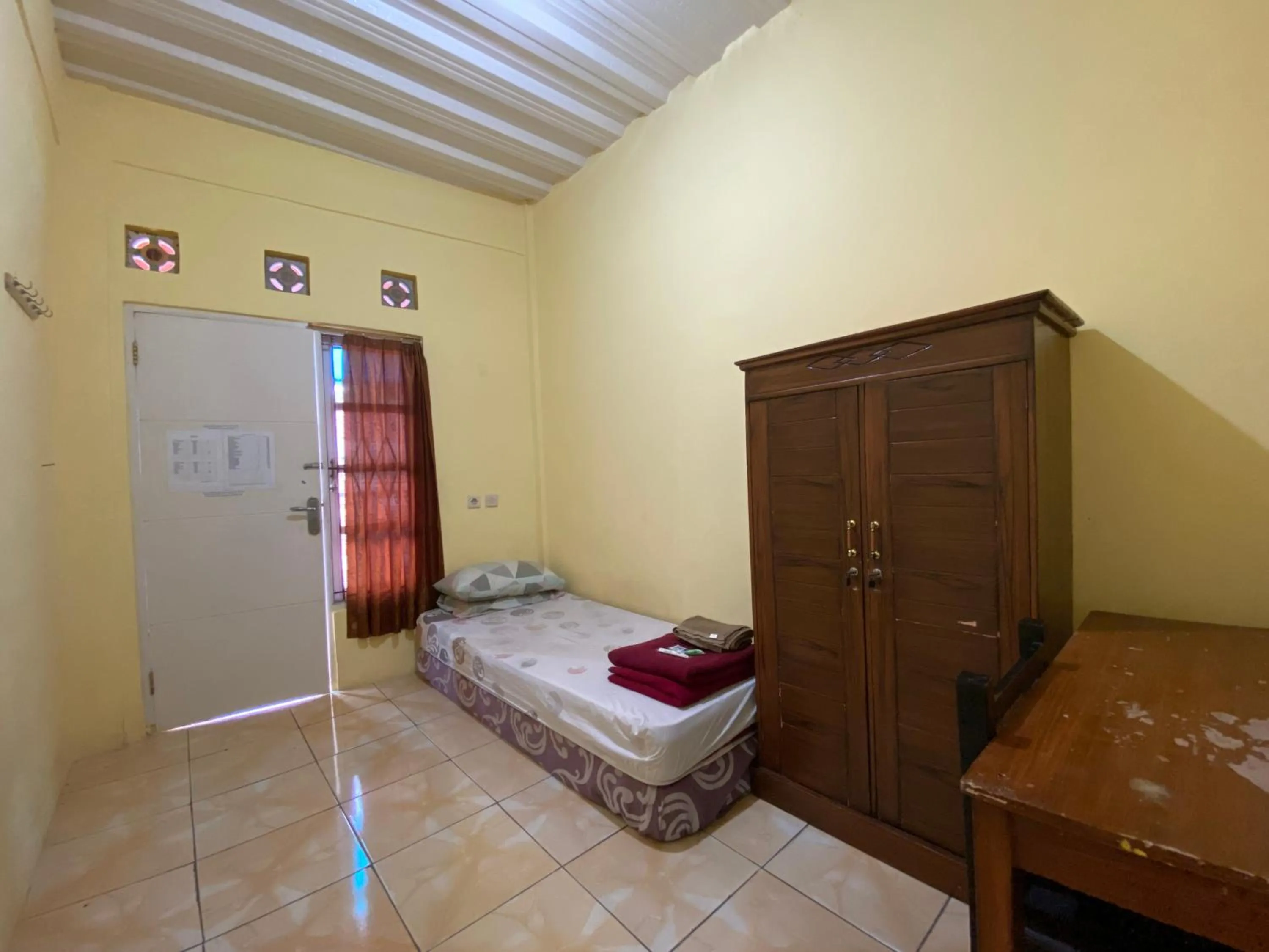 Bedroom in OYO 2562 Pondok Tajlibu Syifa Syariah