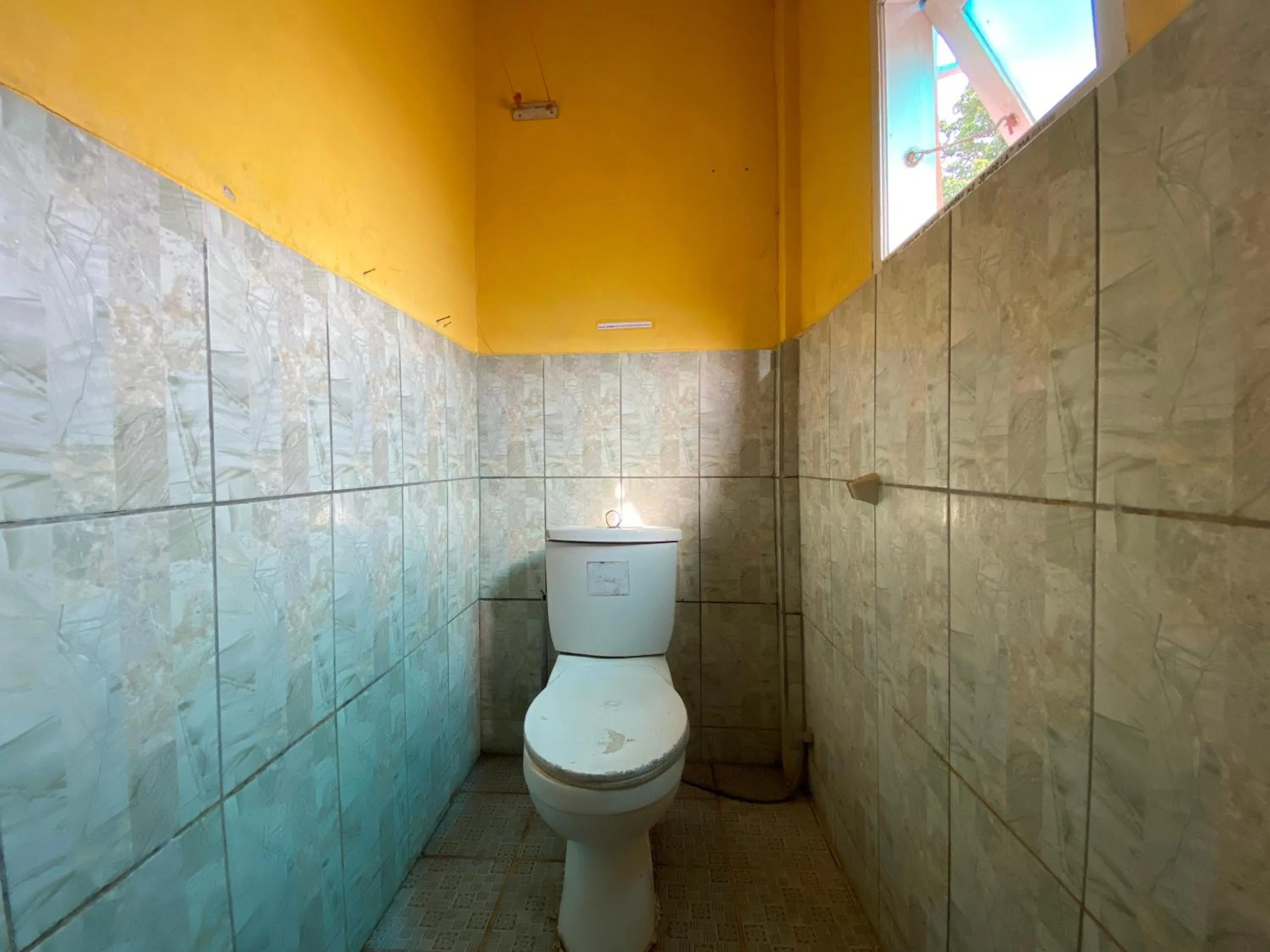 Bedroom in OYO 2562 Pondok Tajlibu Syifa Syariah