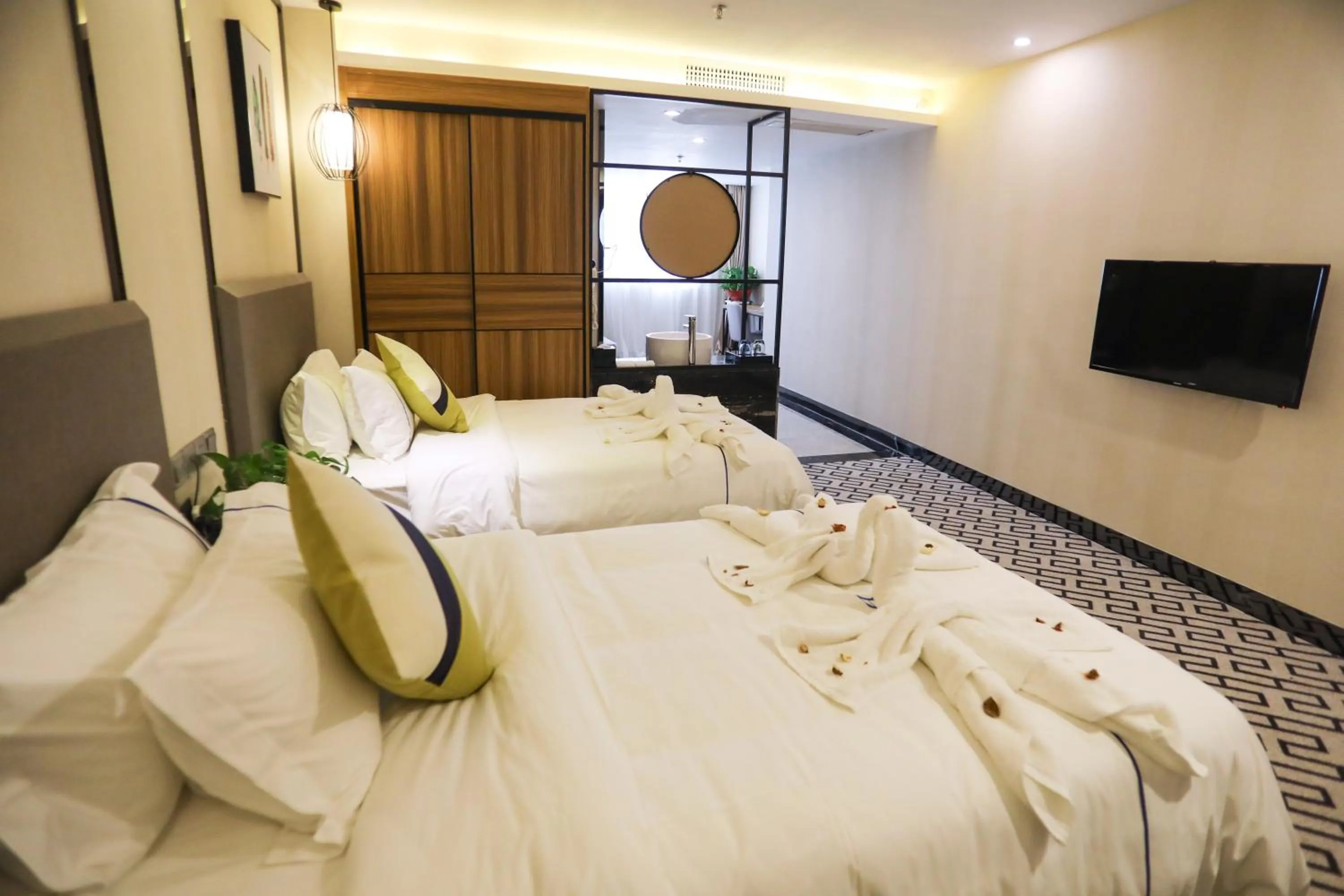 Bed in Guangzhou Homies Hotel