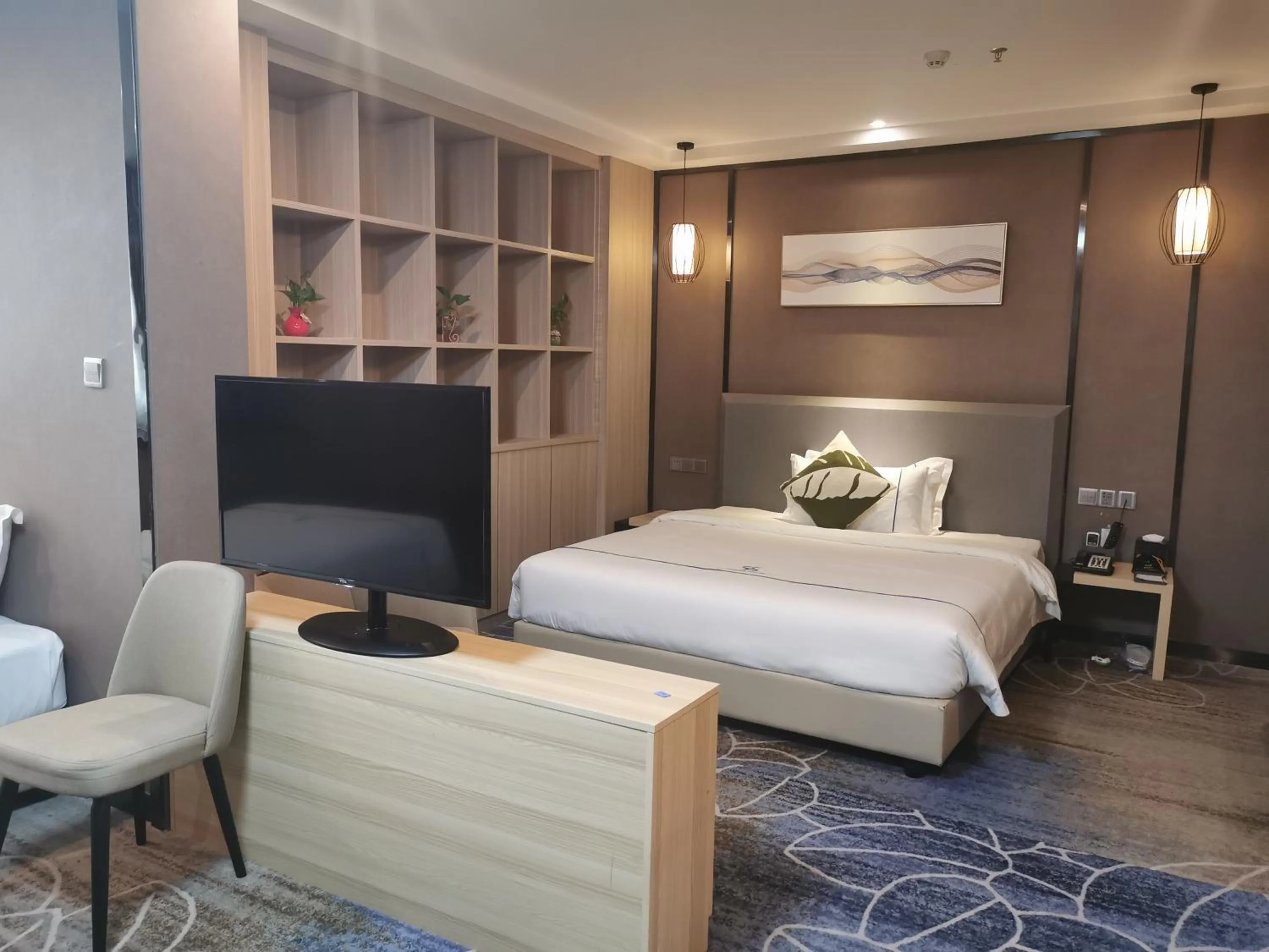 Bed in Guangzhou Homies Hotel