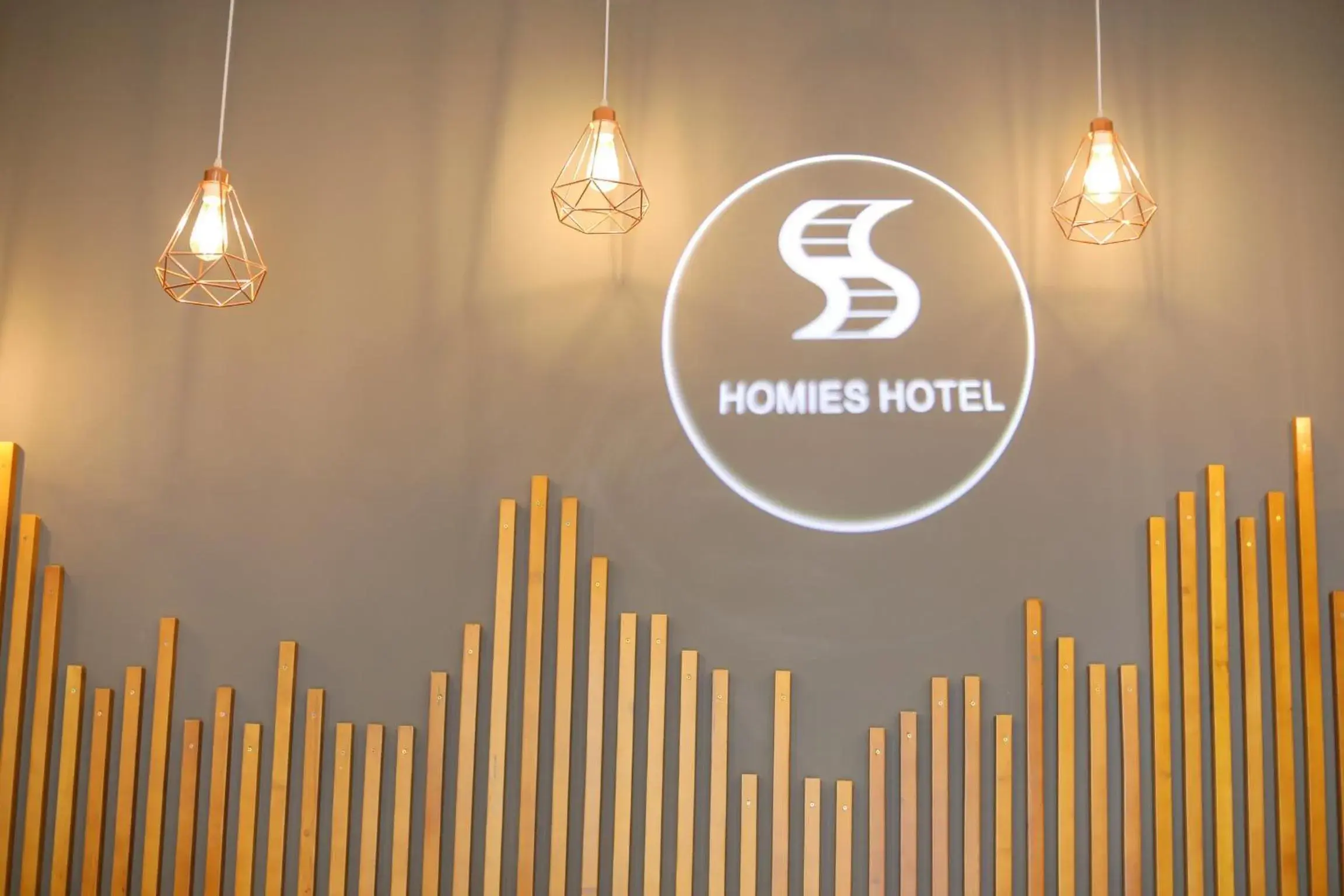 Property Logo/Sign in Homies Hotel