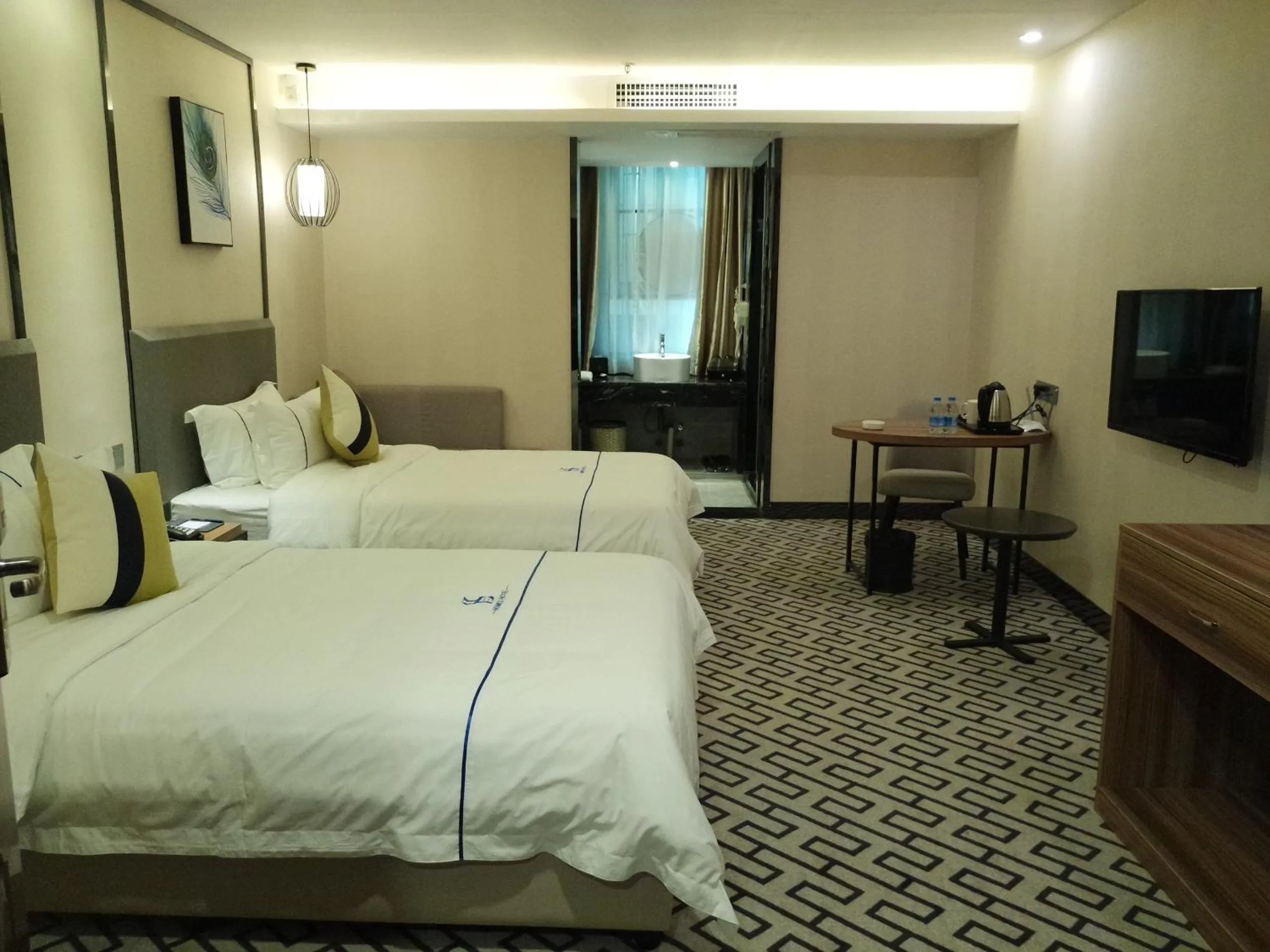 Bed in Guangzhou Homies Hotel