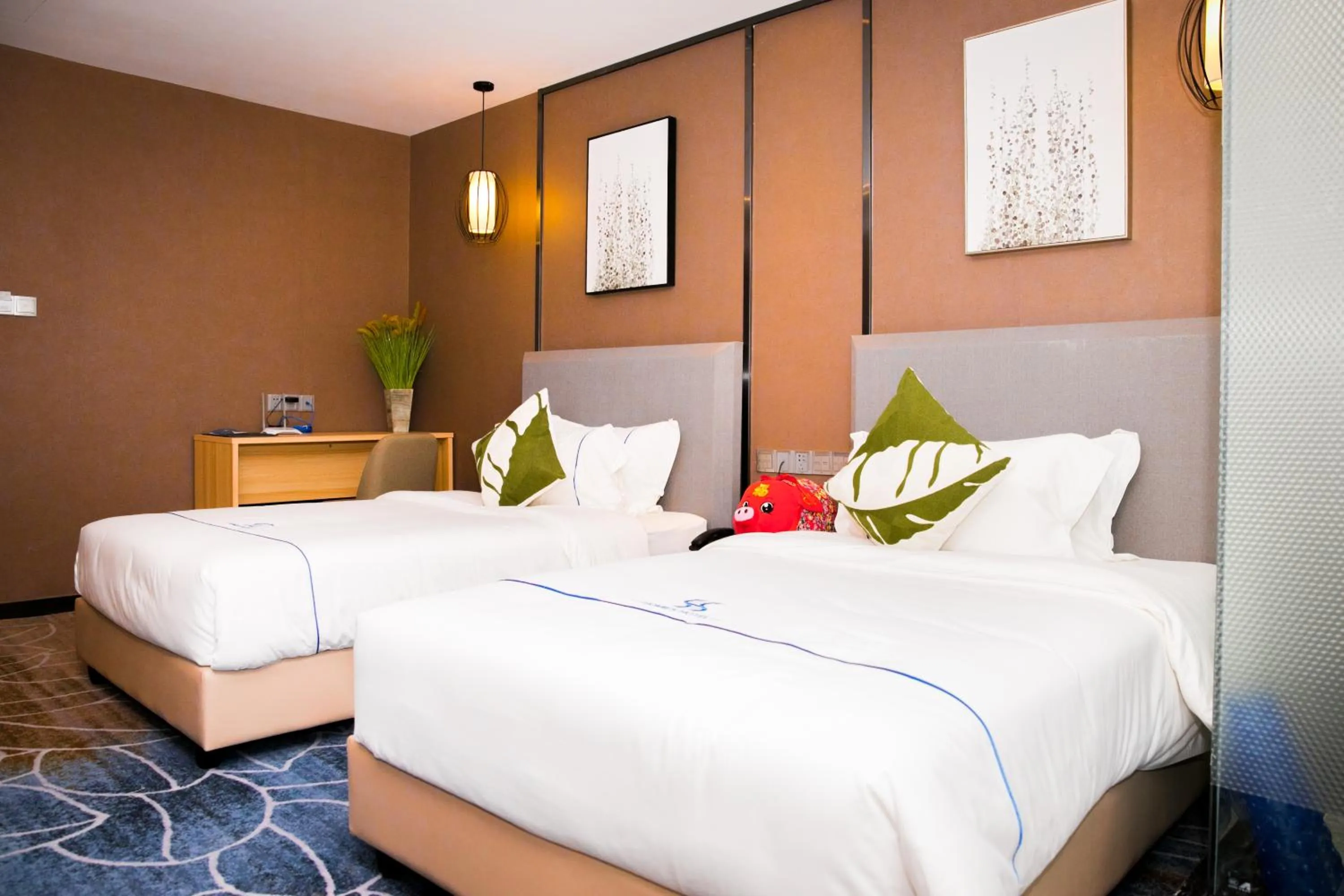 Bed in Guangzhou Homies Hotel