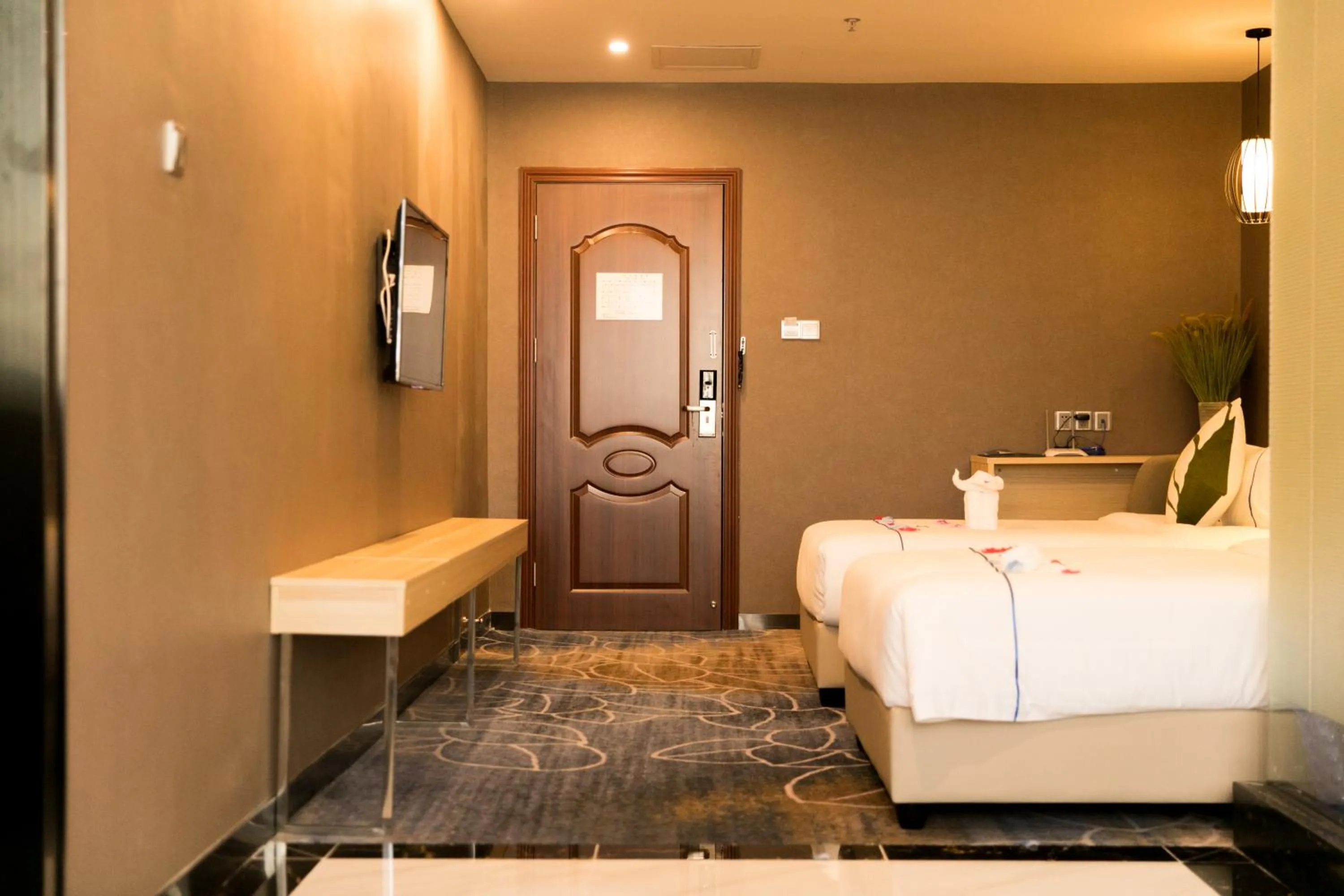 Bed in Guangzhou Homies Hotel