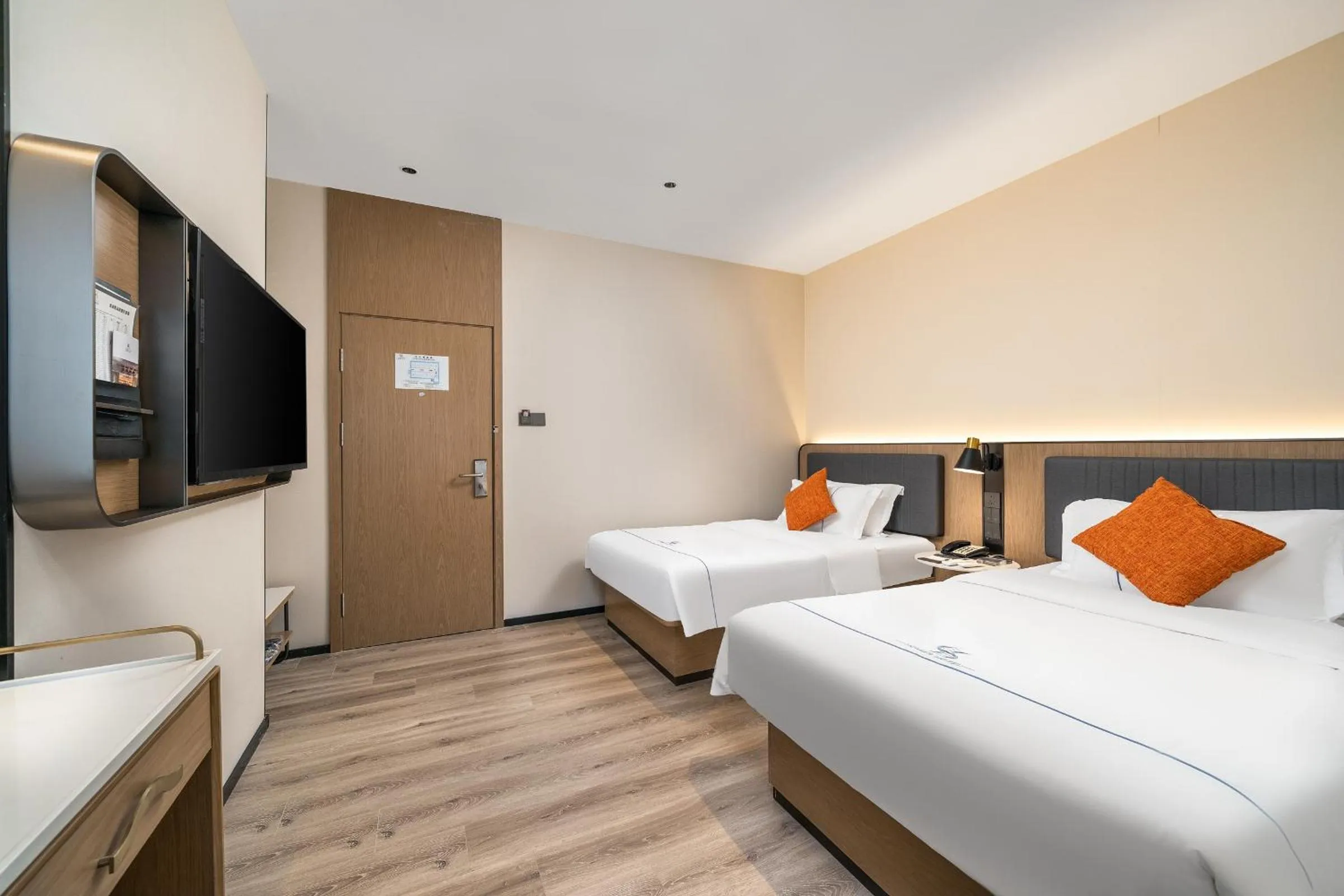 Bed in Guangzhou Homies Hotel