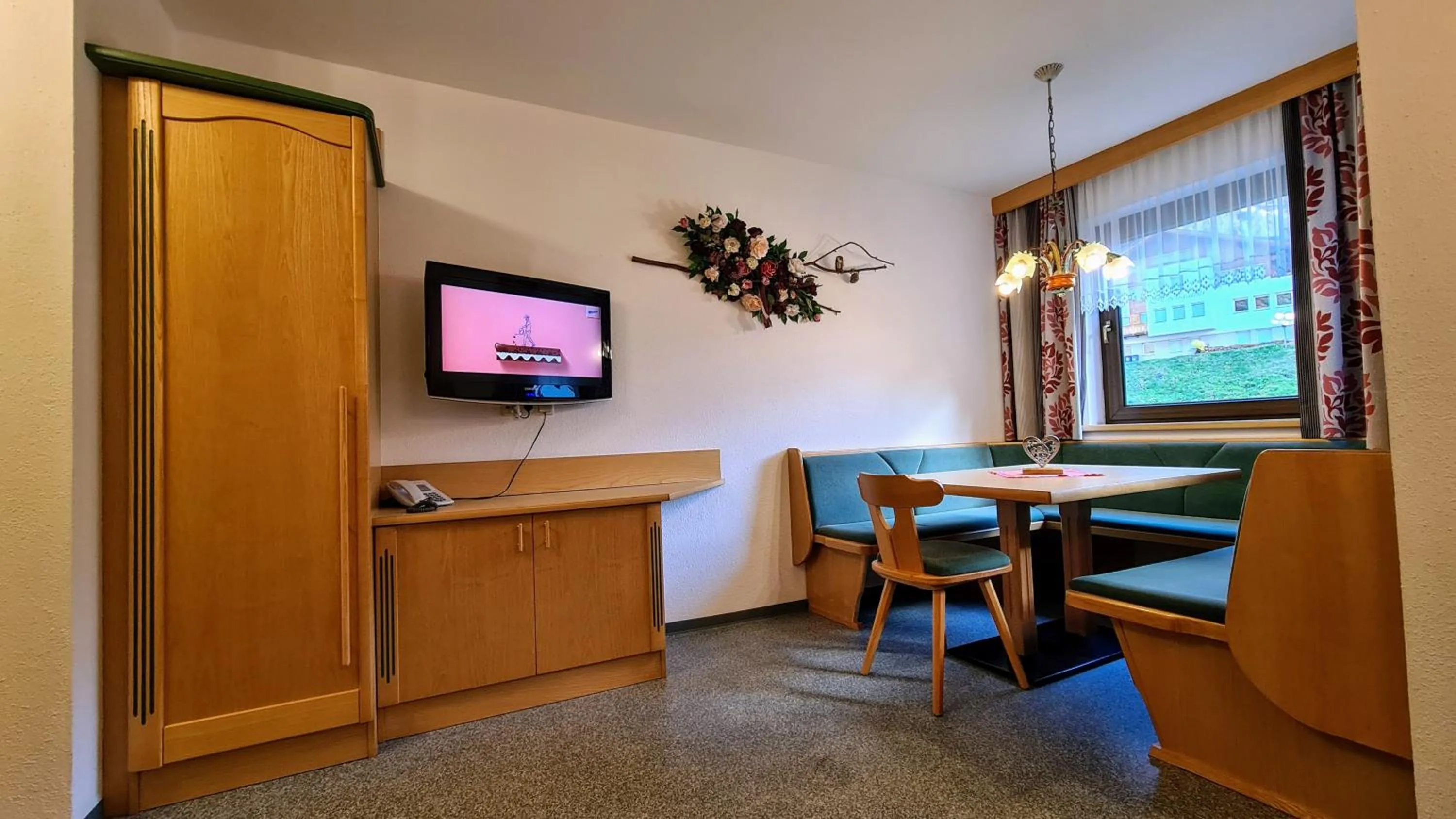 Communal lounge/ TV room in Apart Garni Romantica