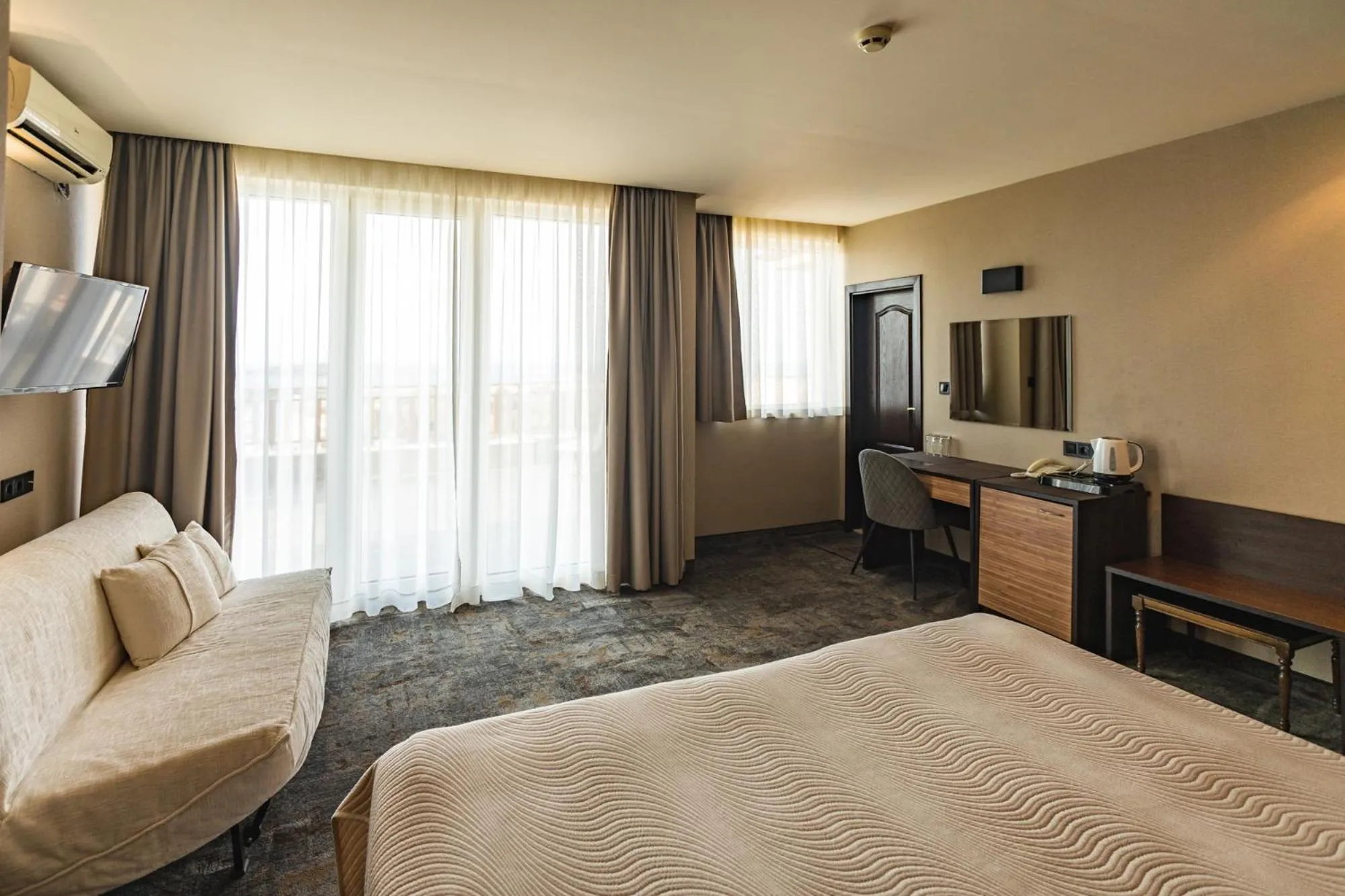 Bed in Kalithea Family Hotel