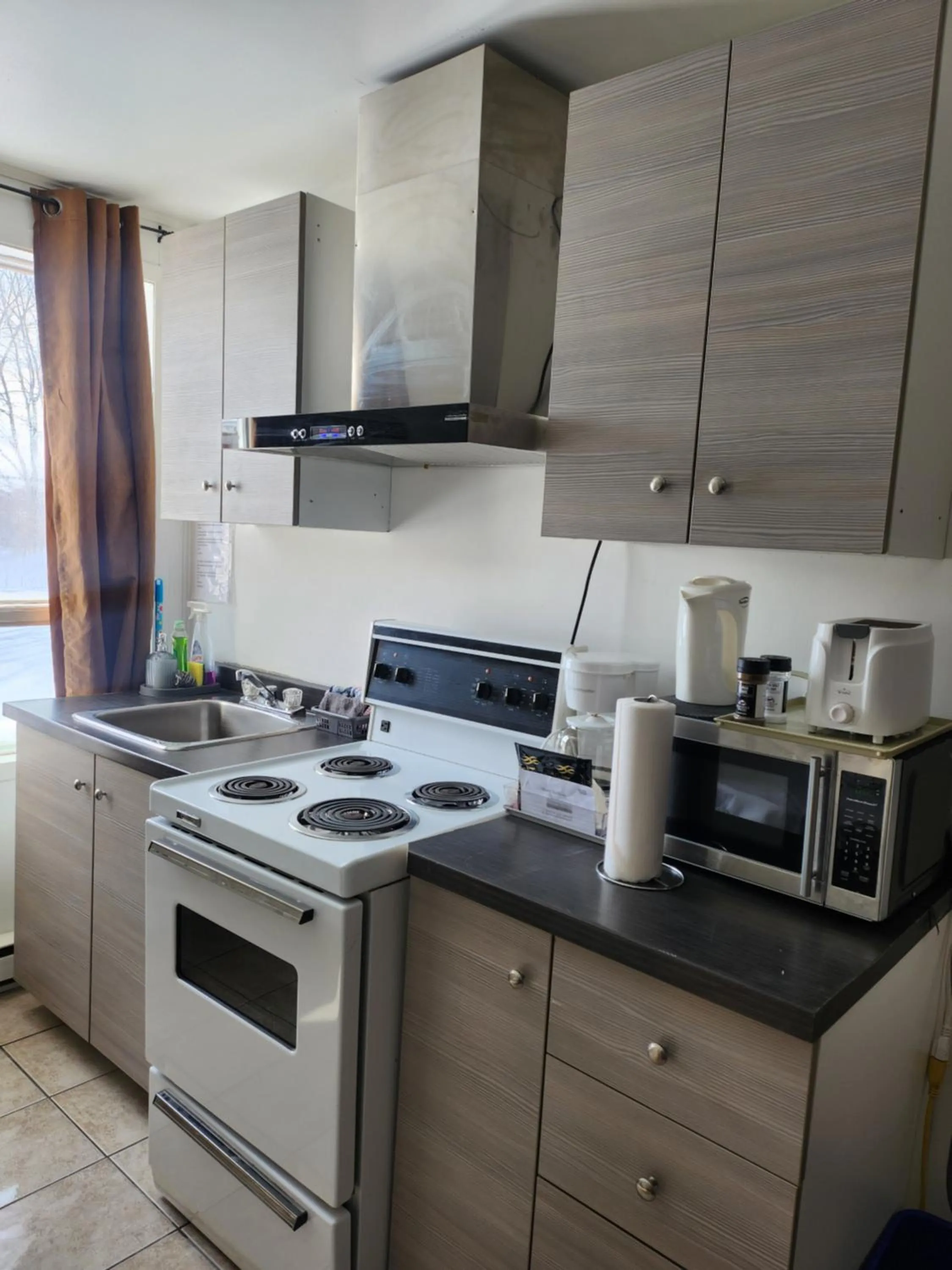 Kitchen or kitchenette in Motel Deblois