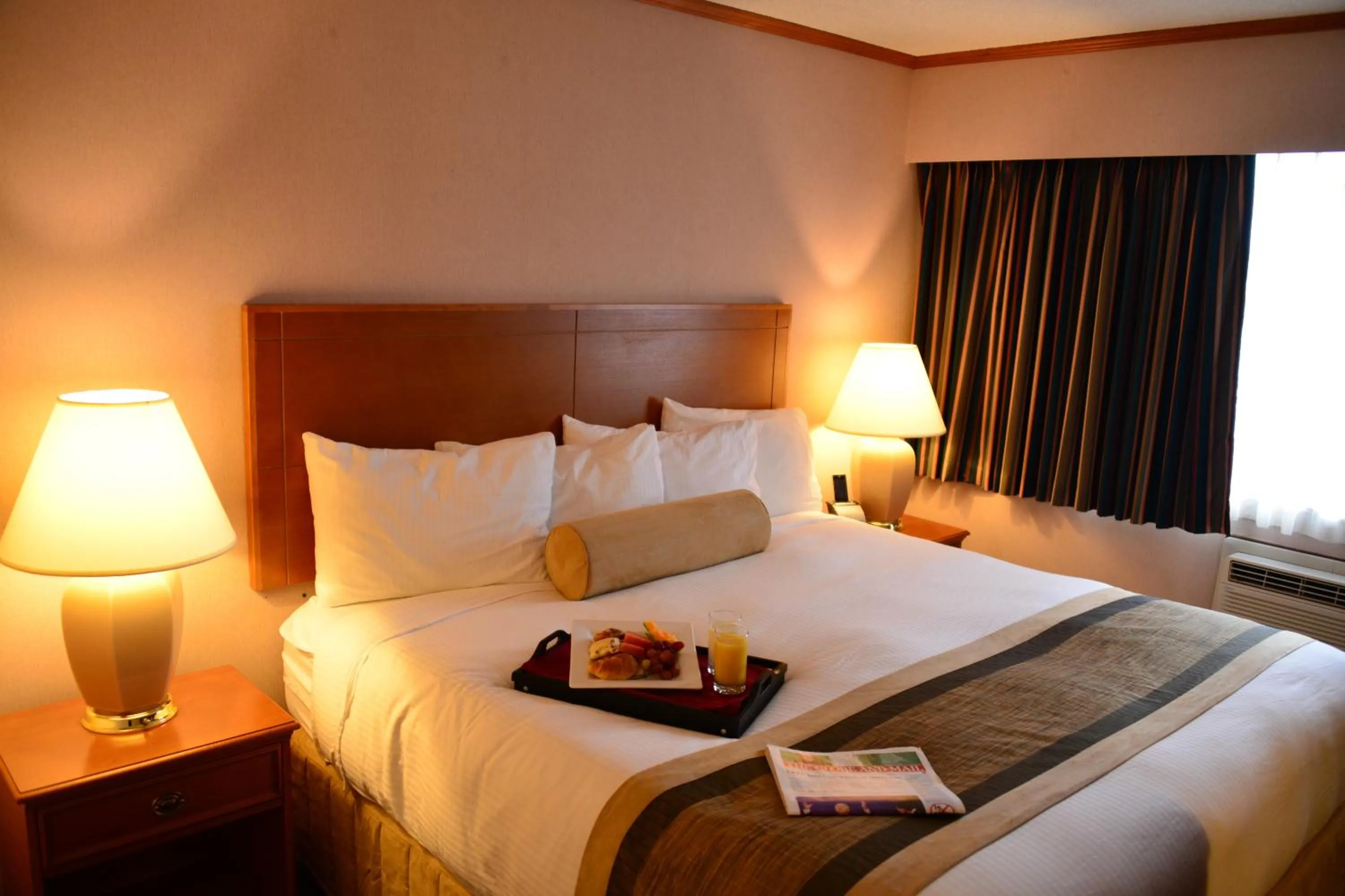 Bed in The Hospitality Inn