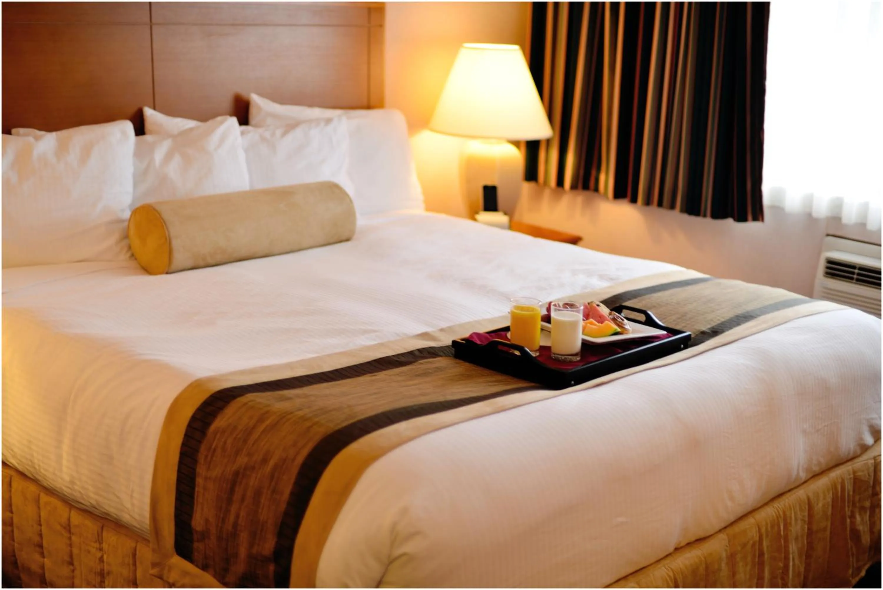 Bed in The Hospitality Inn