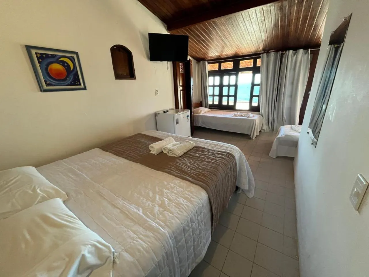 Bed in Pousada Farol do Morro