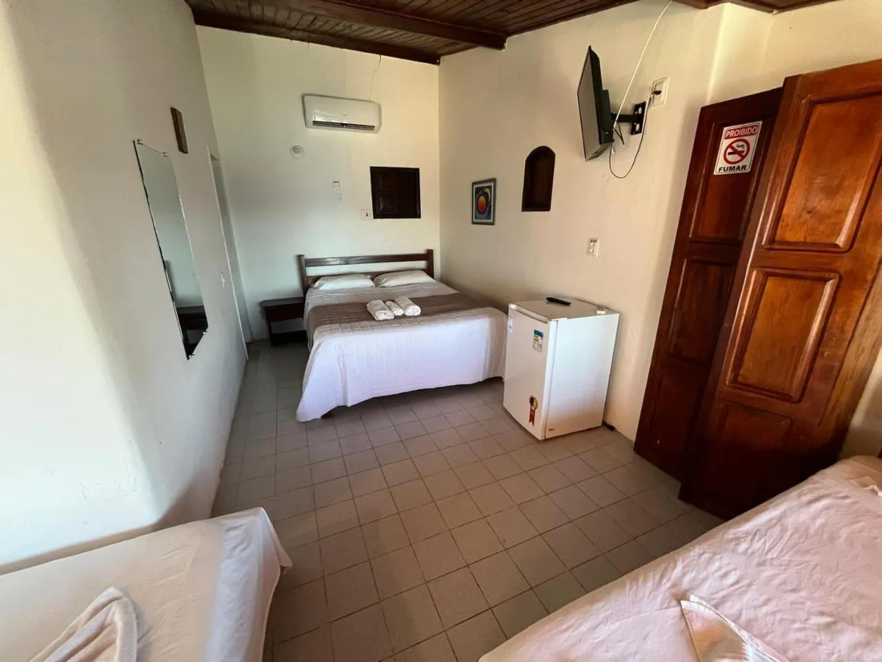 Bed in Pousada Farol do Morro