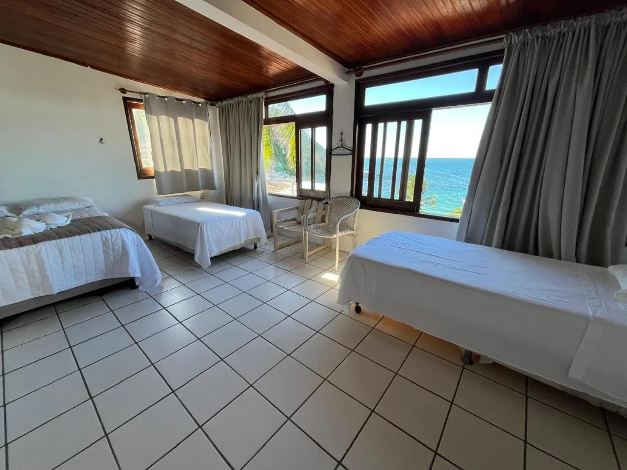 Photo of the whole room, Bed in Pousada Farol do Morro