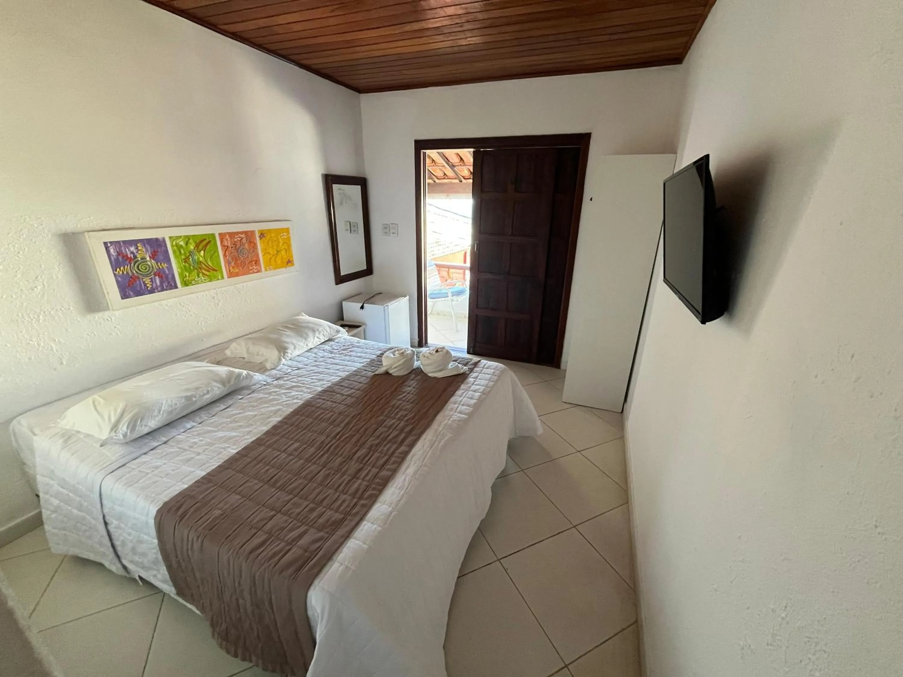 Bed in Pousada Farol do Morro