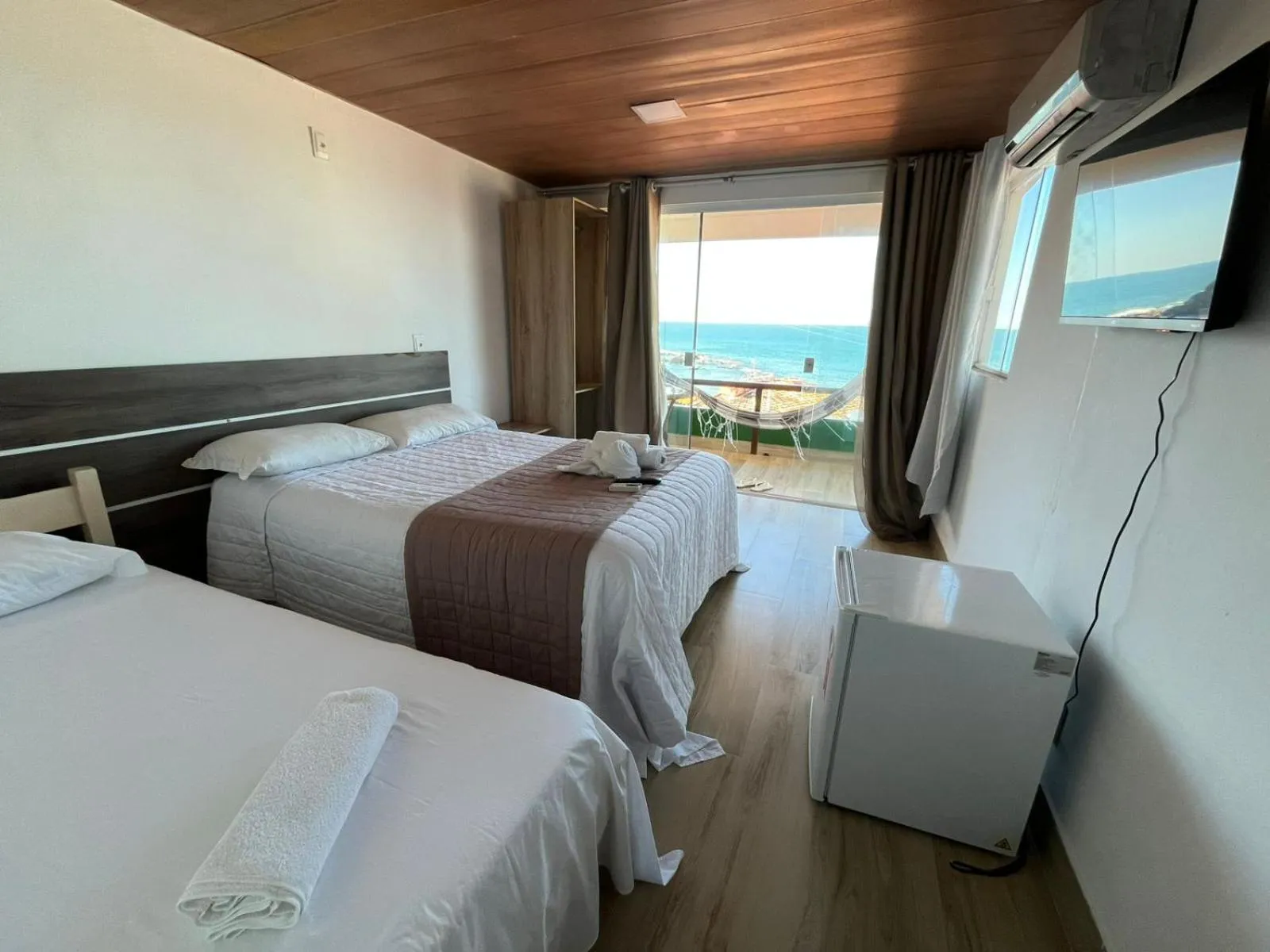 Bed in Pousada Farol do Morro