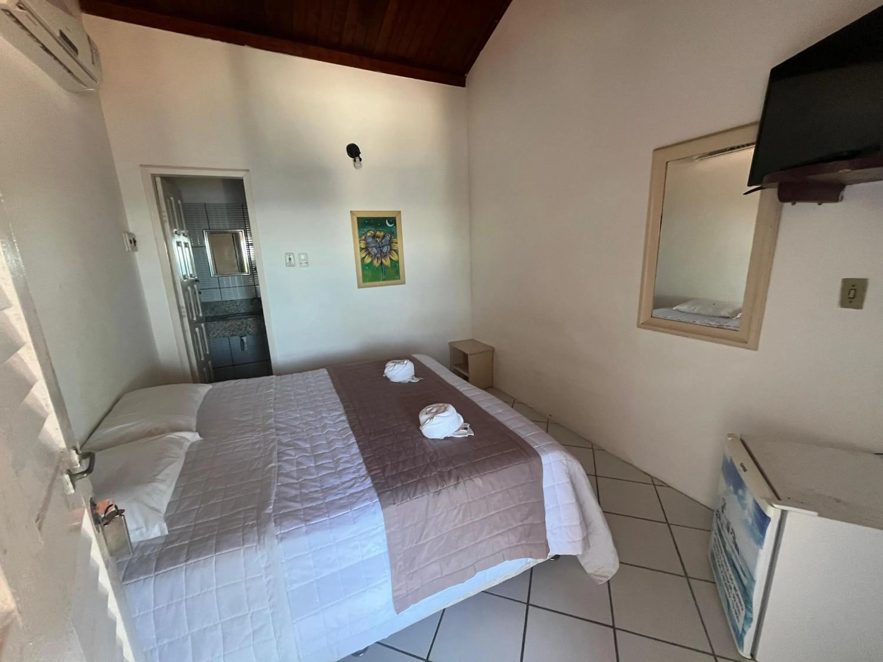 Bed in Pousada Farol do Morro