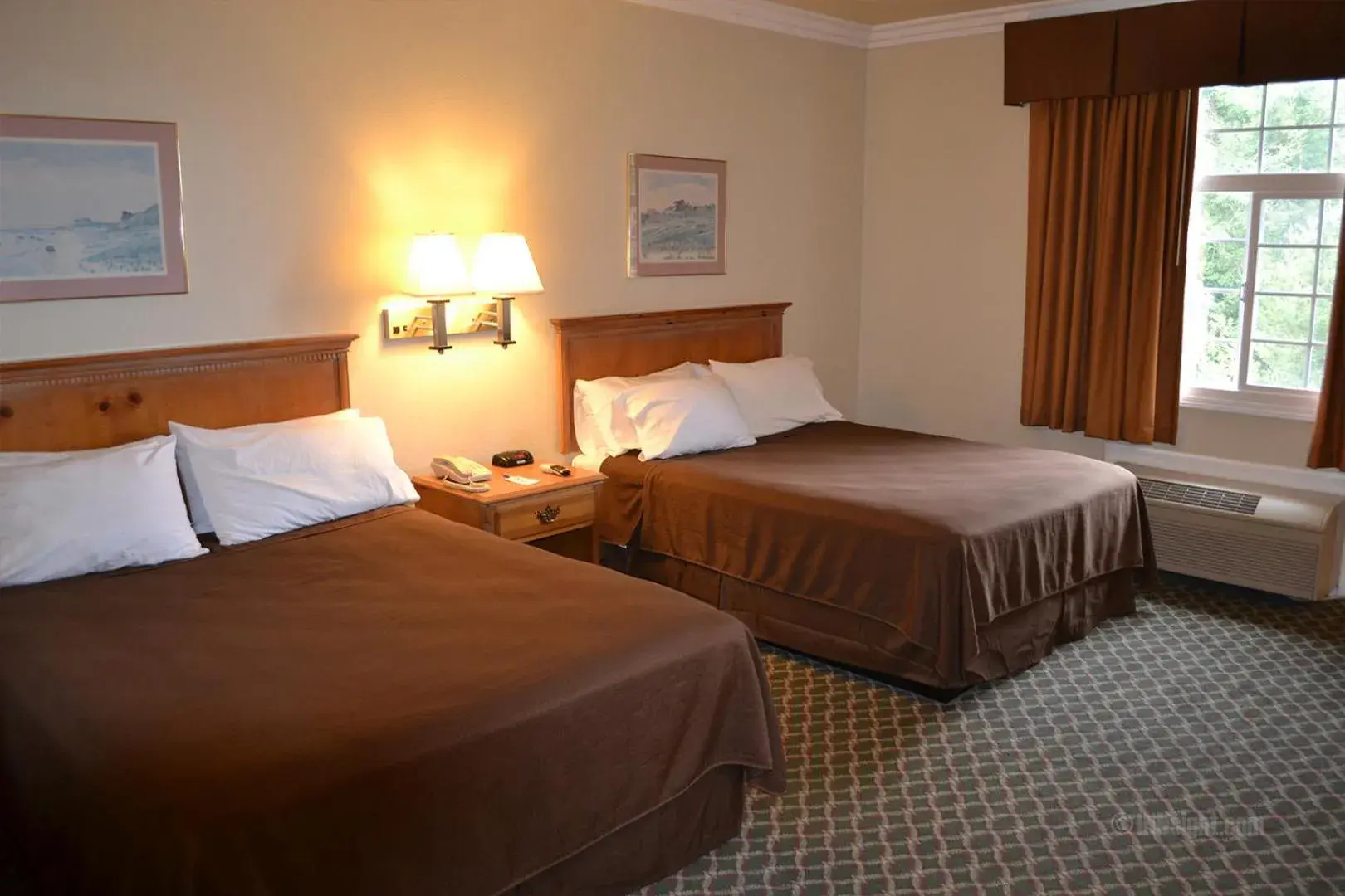 Bed in The Miramar Inn Bed in The Miramar Inn