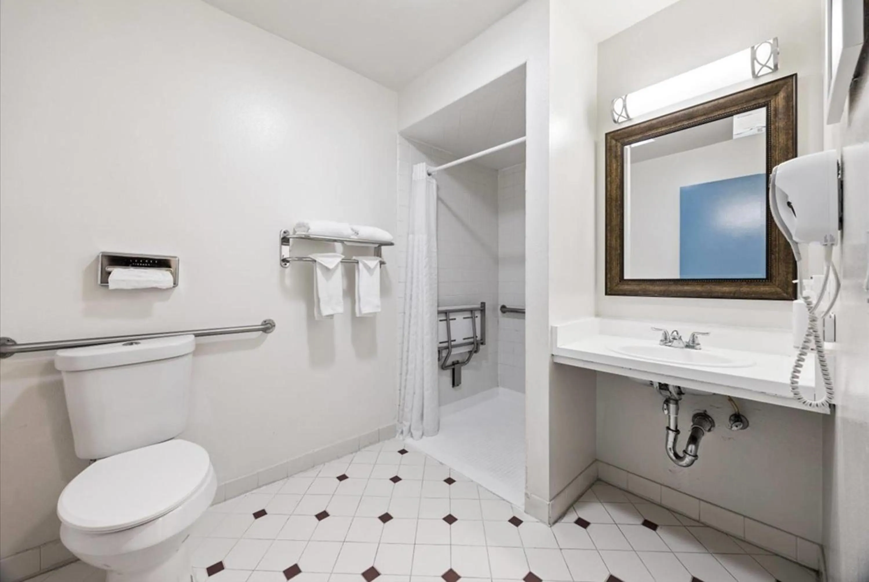 Bathroom in Days Inn by Wyndham Woodland